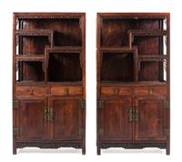 A Pair of Chinese Hardwood Displaying Cabinets 77 x 39 1/2 x 14 3/4 inches. — 20TH CENTURY