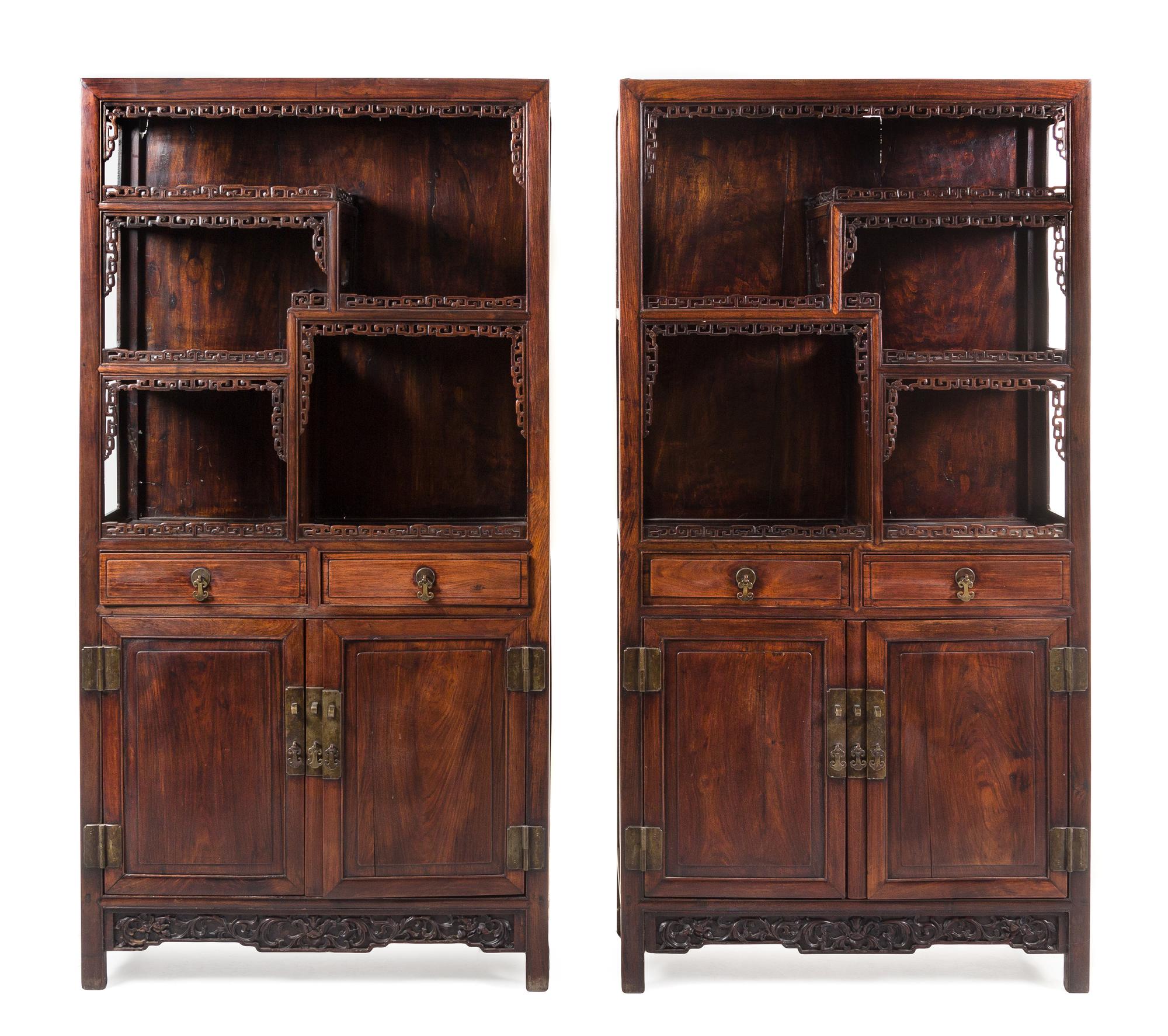 A Pair of Chinese Hardwood Displaying Cabinets 77 x 39 1/2 x 14 3/4 inches. — 20TH CENTURY