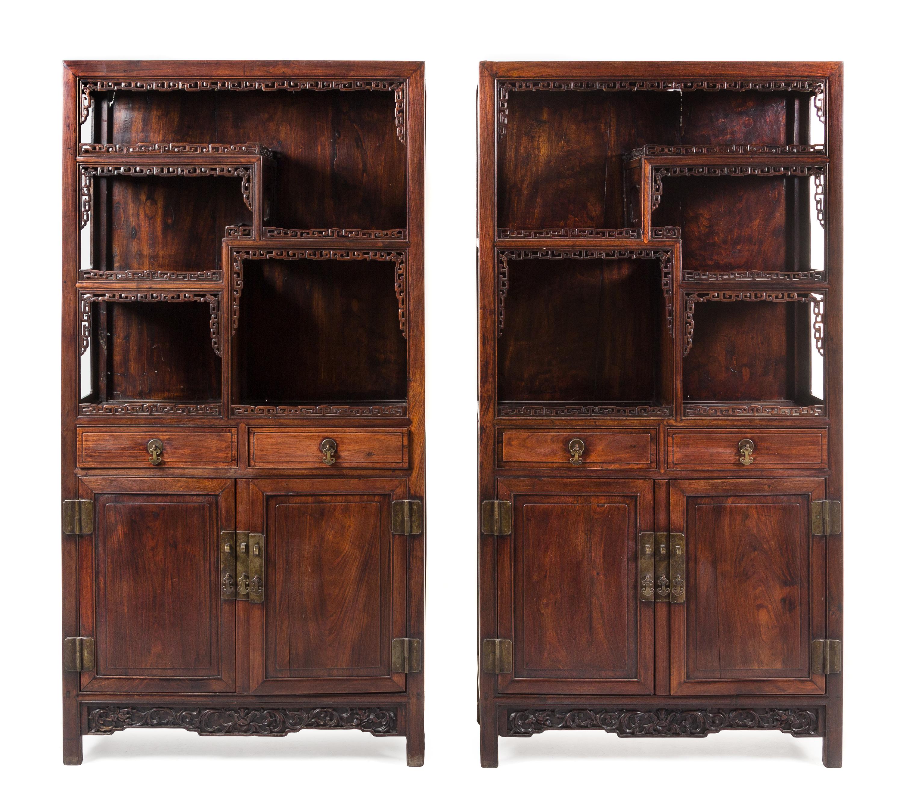 A Pair of Chinese Hardwood Displaying Cabinets 77 x 39 1/2 x 14 3/4 inches. — 20TH CENTURY