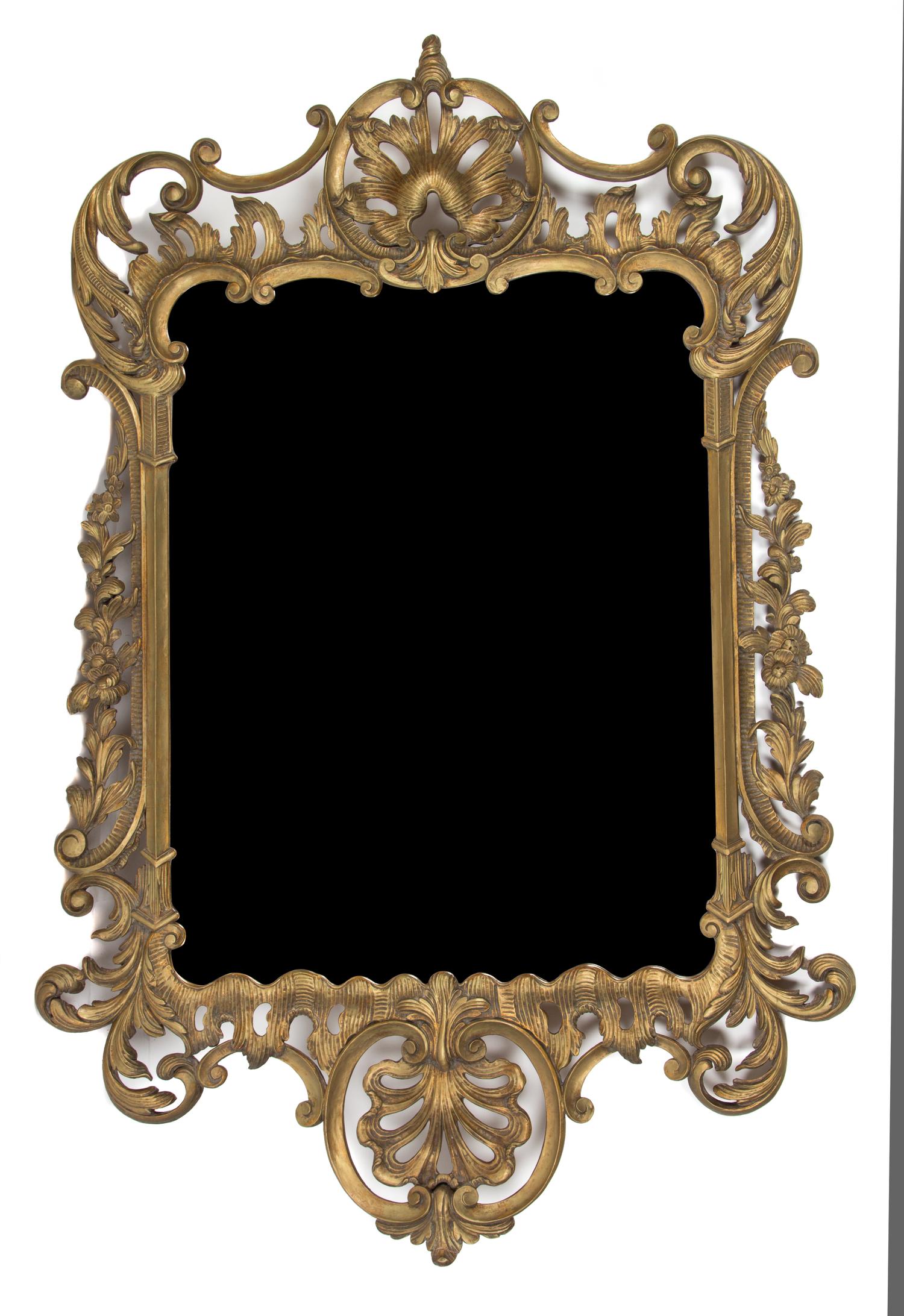 A Louis XV Style Carved Giltwood Wall Mirror Height 56 1/2 x width 27 1/2 inches. — 20TH CENTURY
