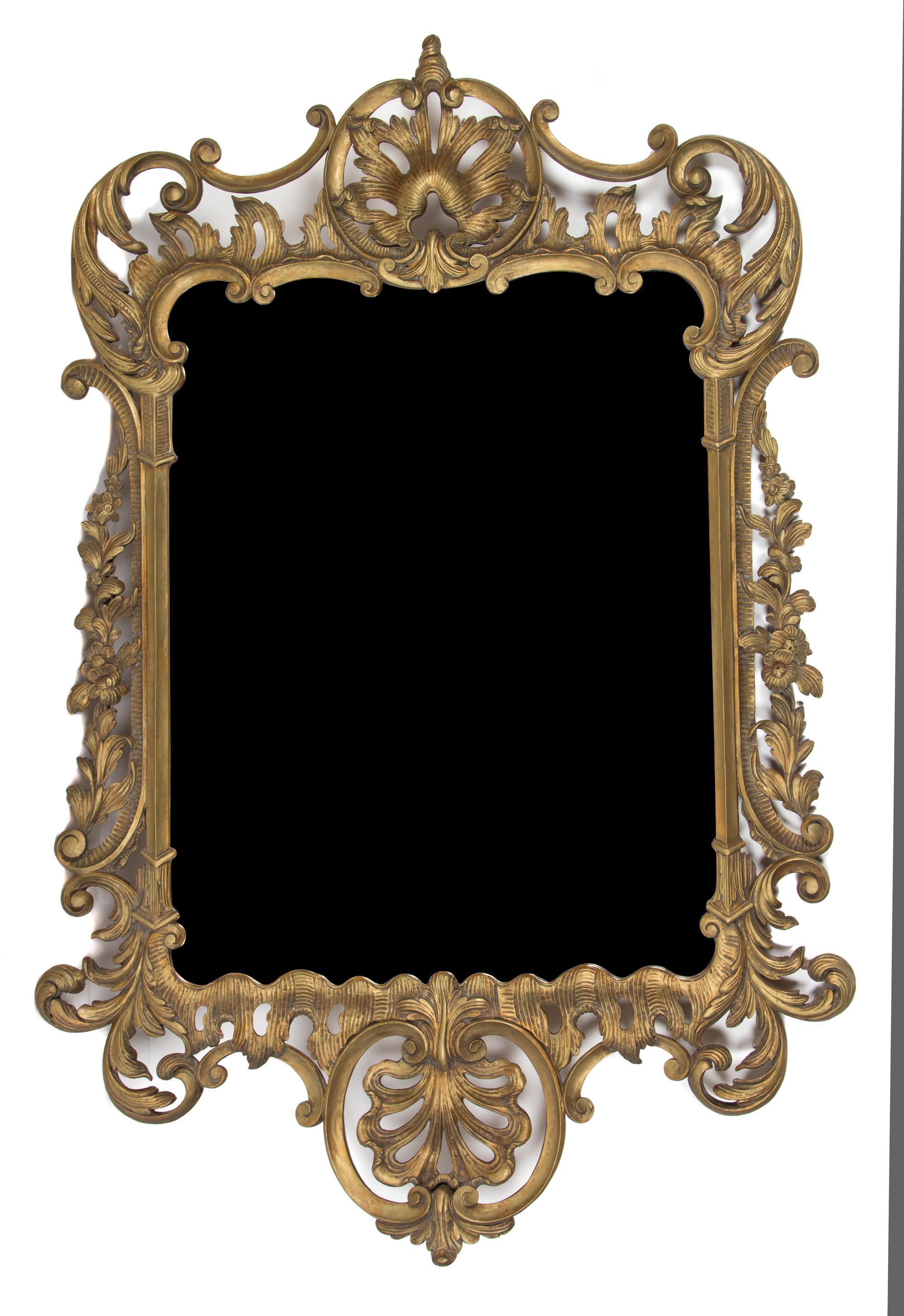 A Louis XV Style Carved Giltwood Wall Mirror Height 56 1/2 x width 27 1/2 inches. — 20TH CENTURY