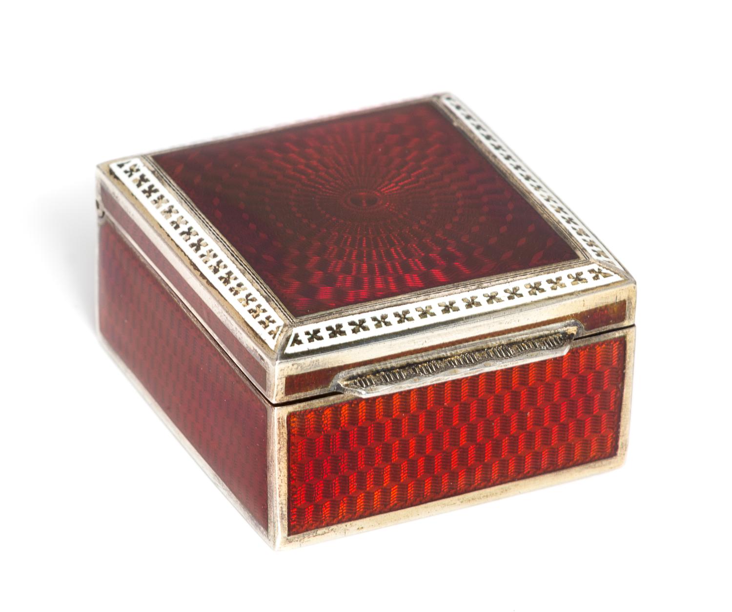 An Austrian Silver and Enamel Box, Maker's Mark J&W, Vienna, 20th Century, the lid and sides with red guilloche enamel.