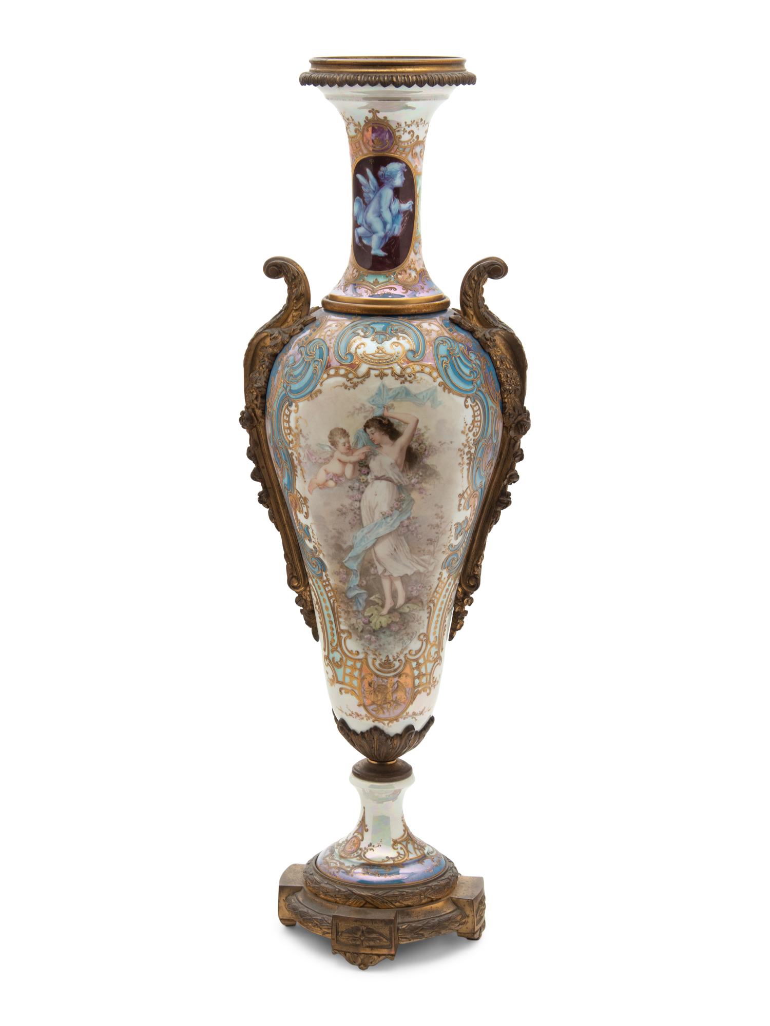 A Sèvres Style Gilt Bronze Mounted Porcelain Urn