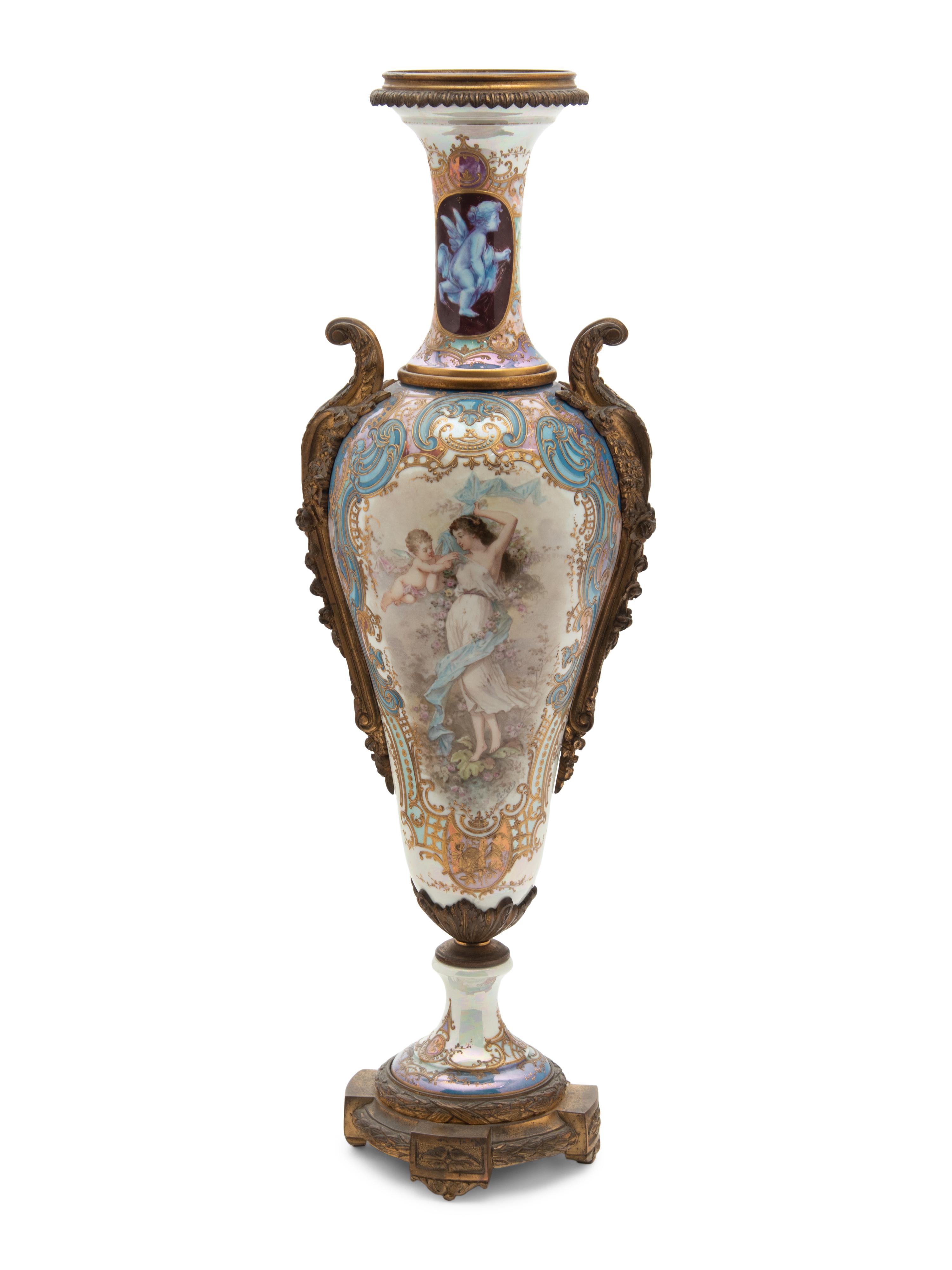 A Sèvres Style Gilt Bronze Mounted Porcelain Urn