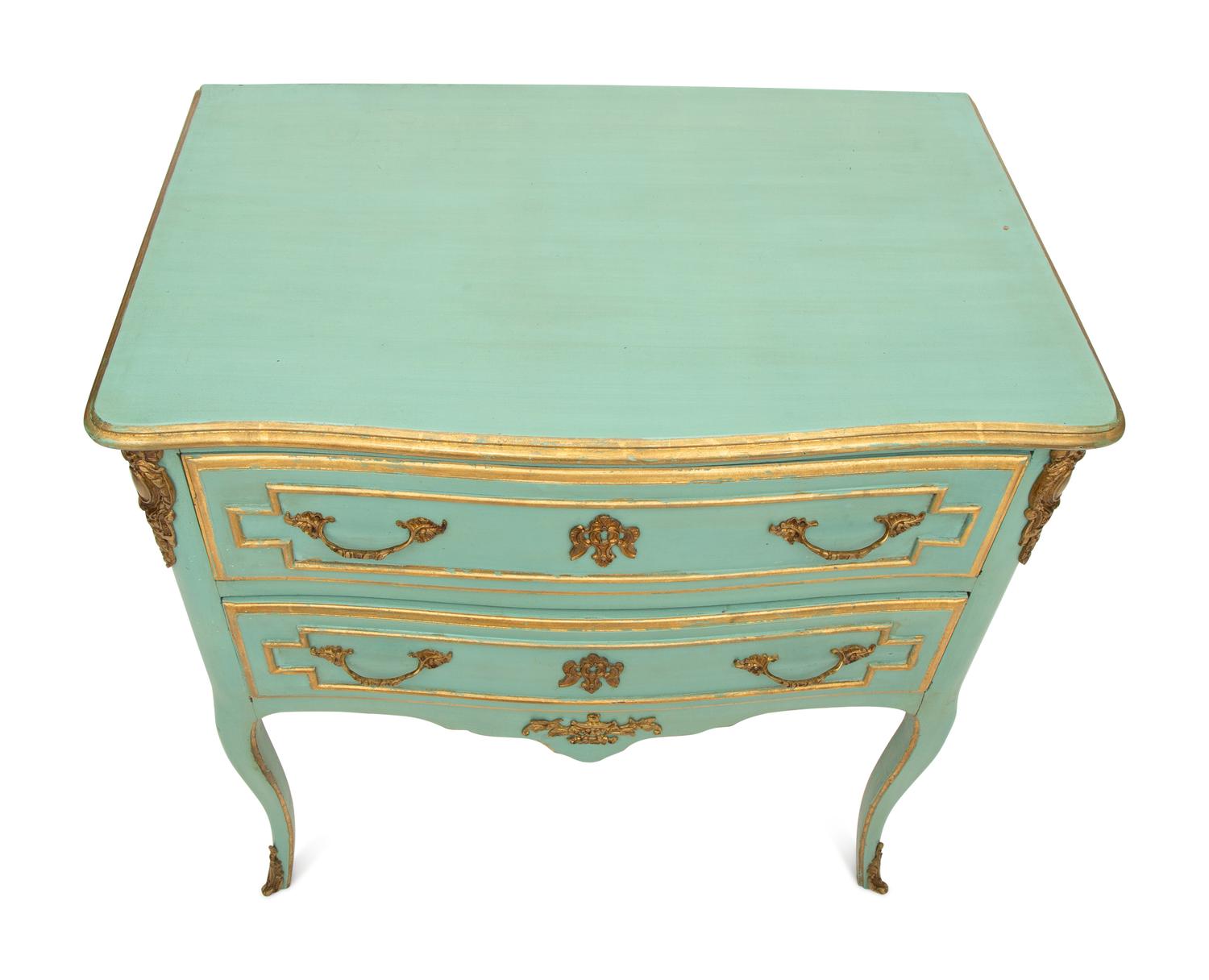 A Louis XV Style Painted and Parcel Gilt Commode