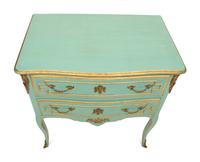 A Louis XV Style Painted and Parcel Gilt Commode