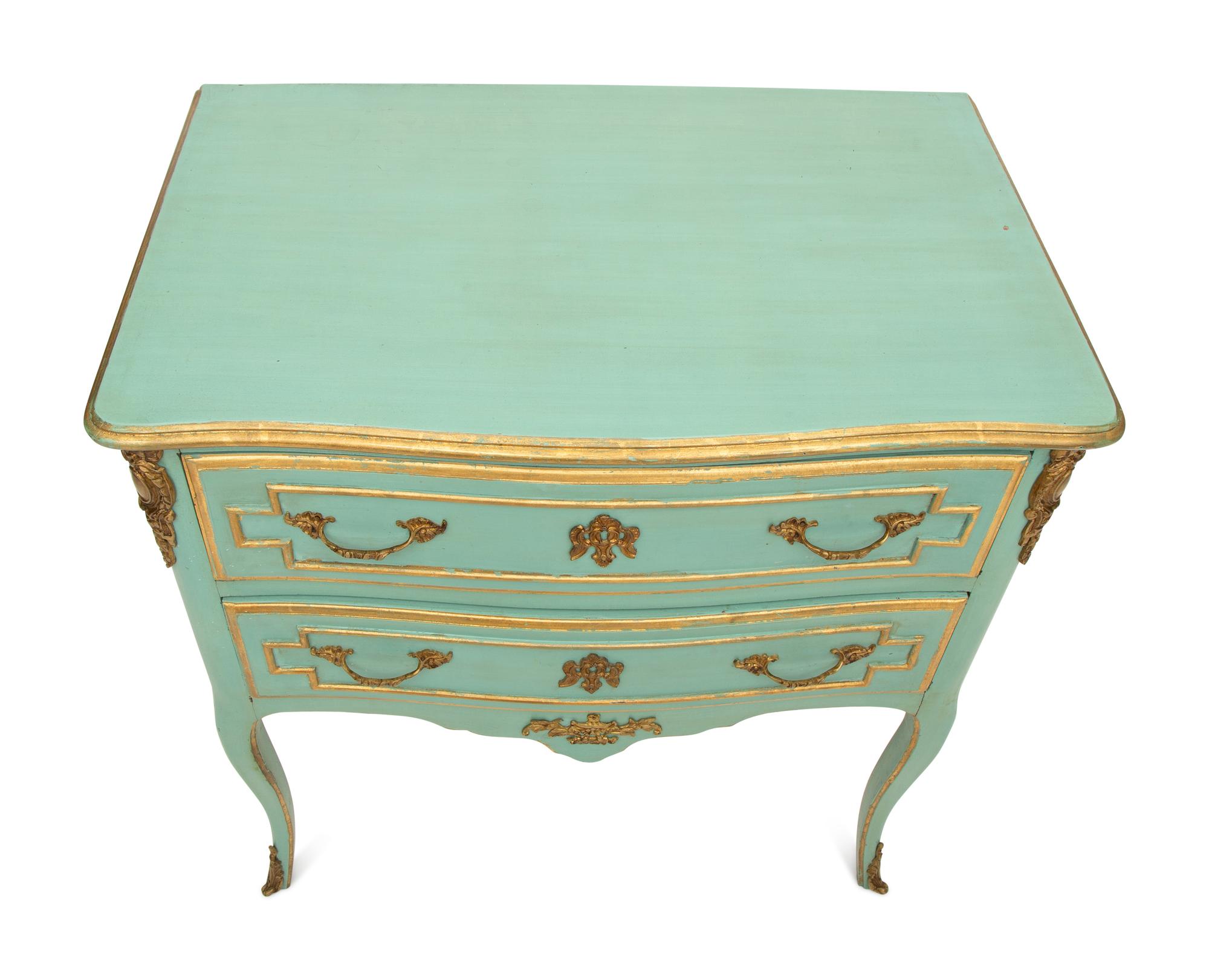 A Louis XV Style Painted and Parcel Gilt Commode