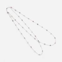 An 18 Karat White Gold Sapphire Station Necklace