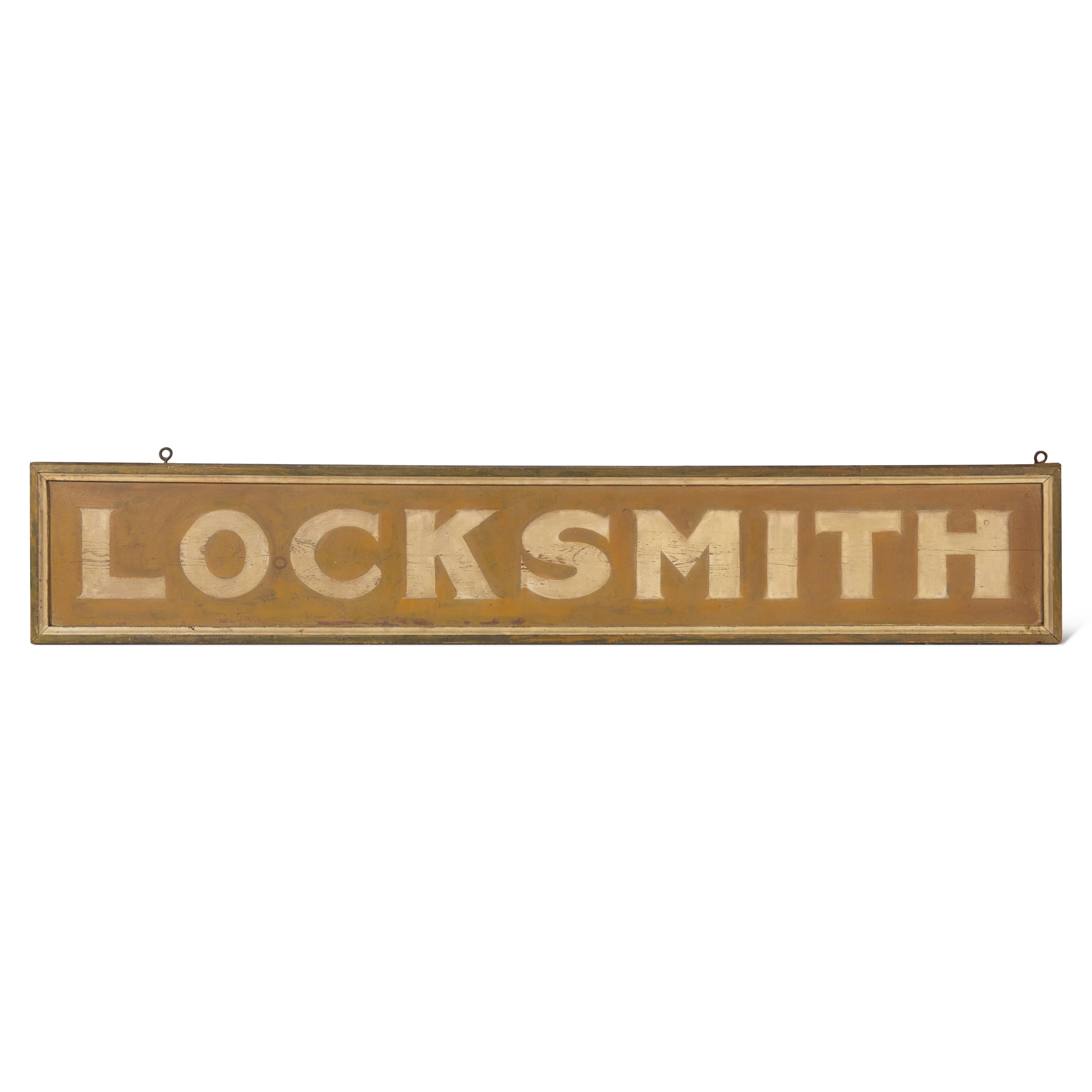 A Painted Wood Locksmith Trade Sign