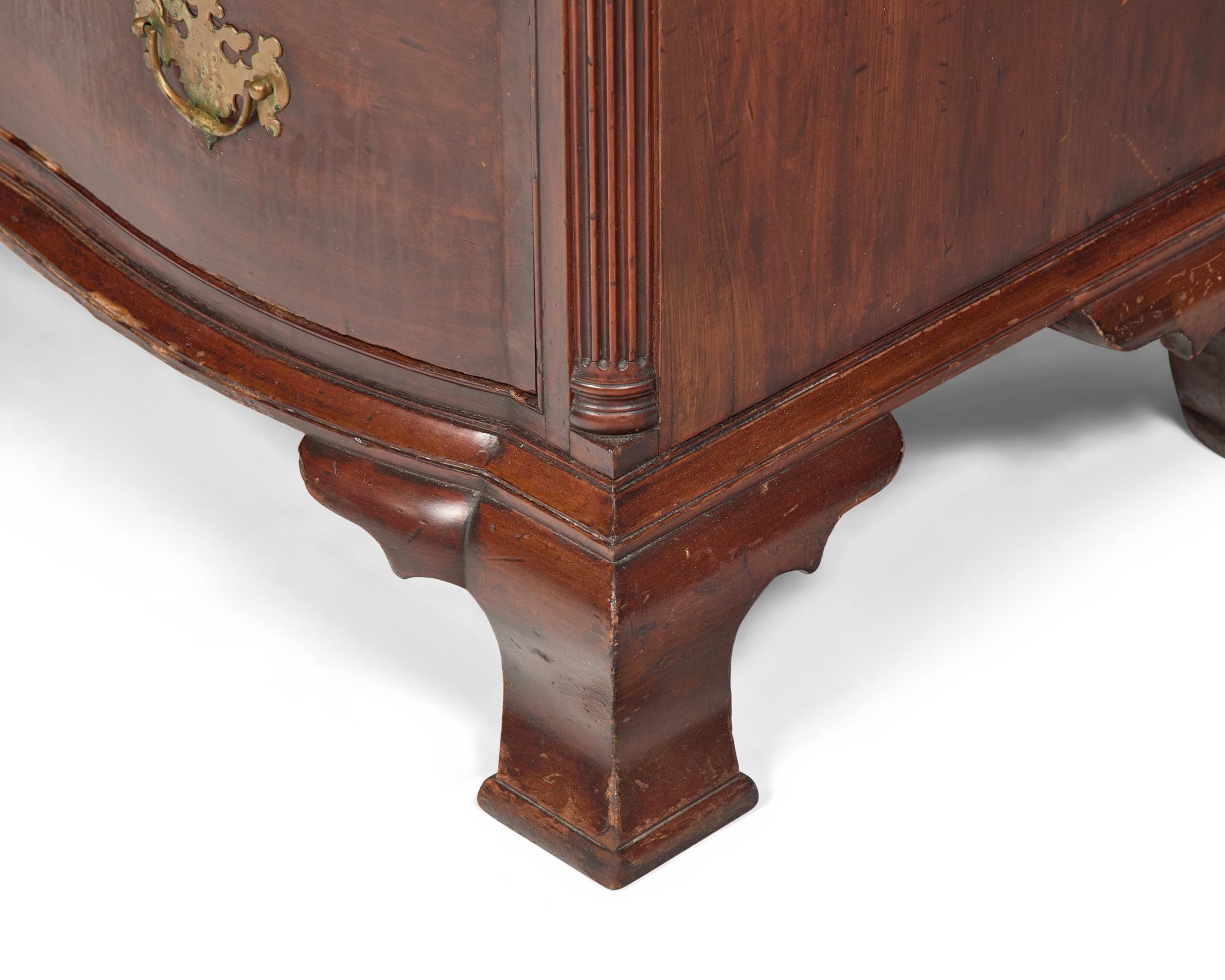 A Chippendale Cherry Oxbow Chest of Drawers