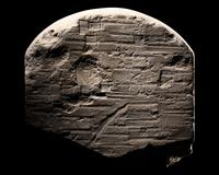 An Egyptian Limestone Round-Topped Stele