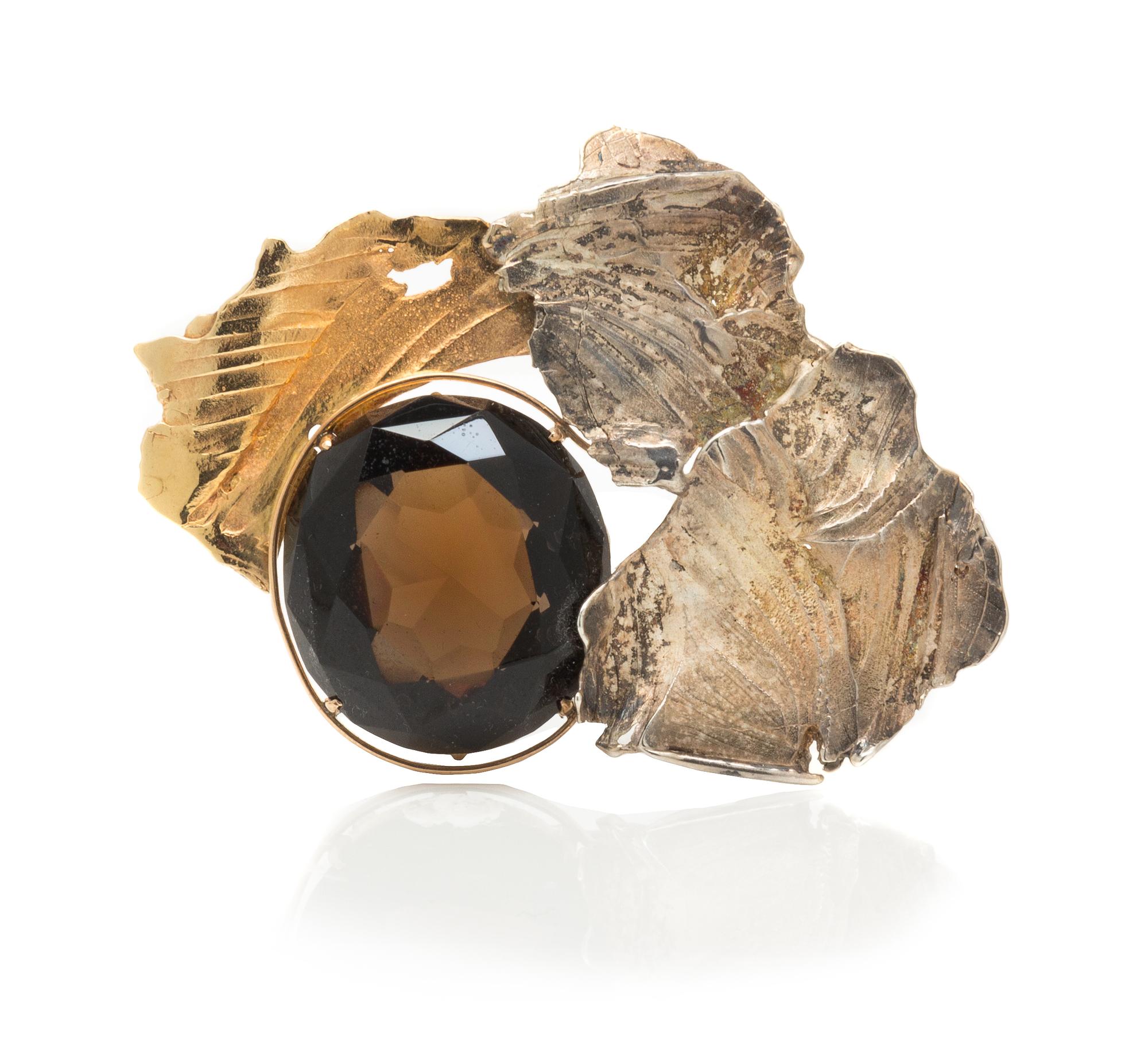 A Bicolor Gold and Smokey Quartz Brooch, Eve Alfille, 25.20 dwts.