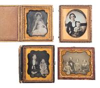 [EARLY PHOTOGRAPHY]. 18 daguerreotype portraits of parents with children, including: