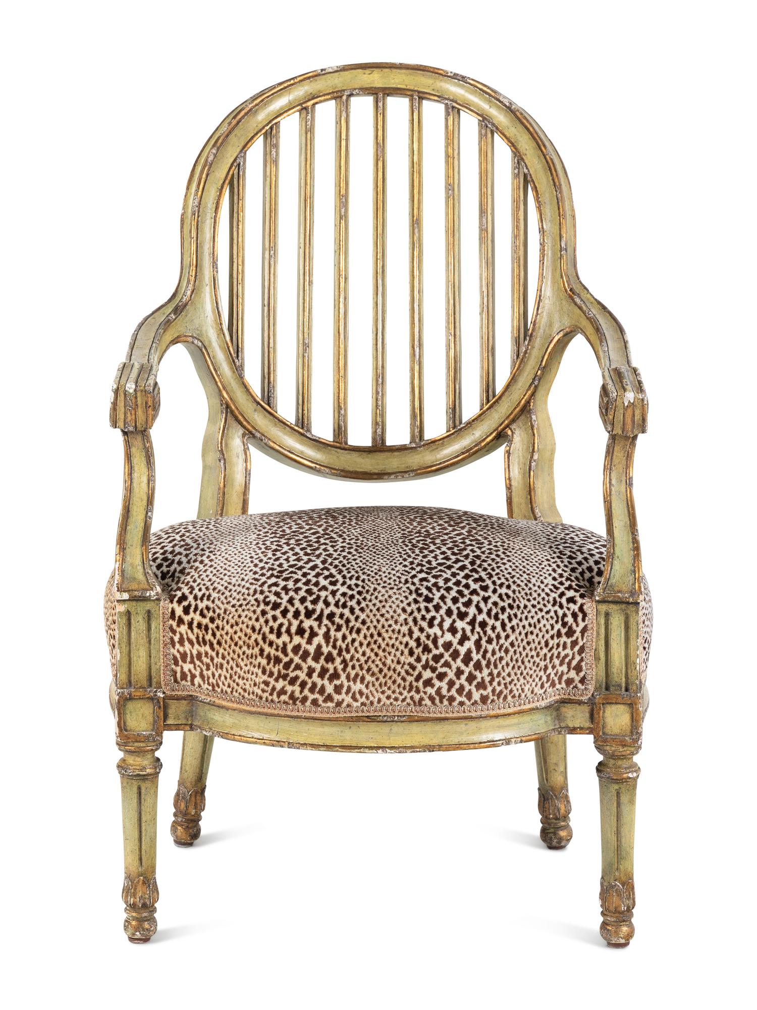 A Louis XVI Style Painted and Parcel-Gilt Fauteuil
