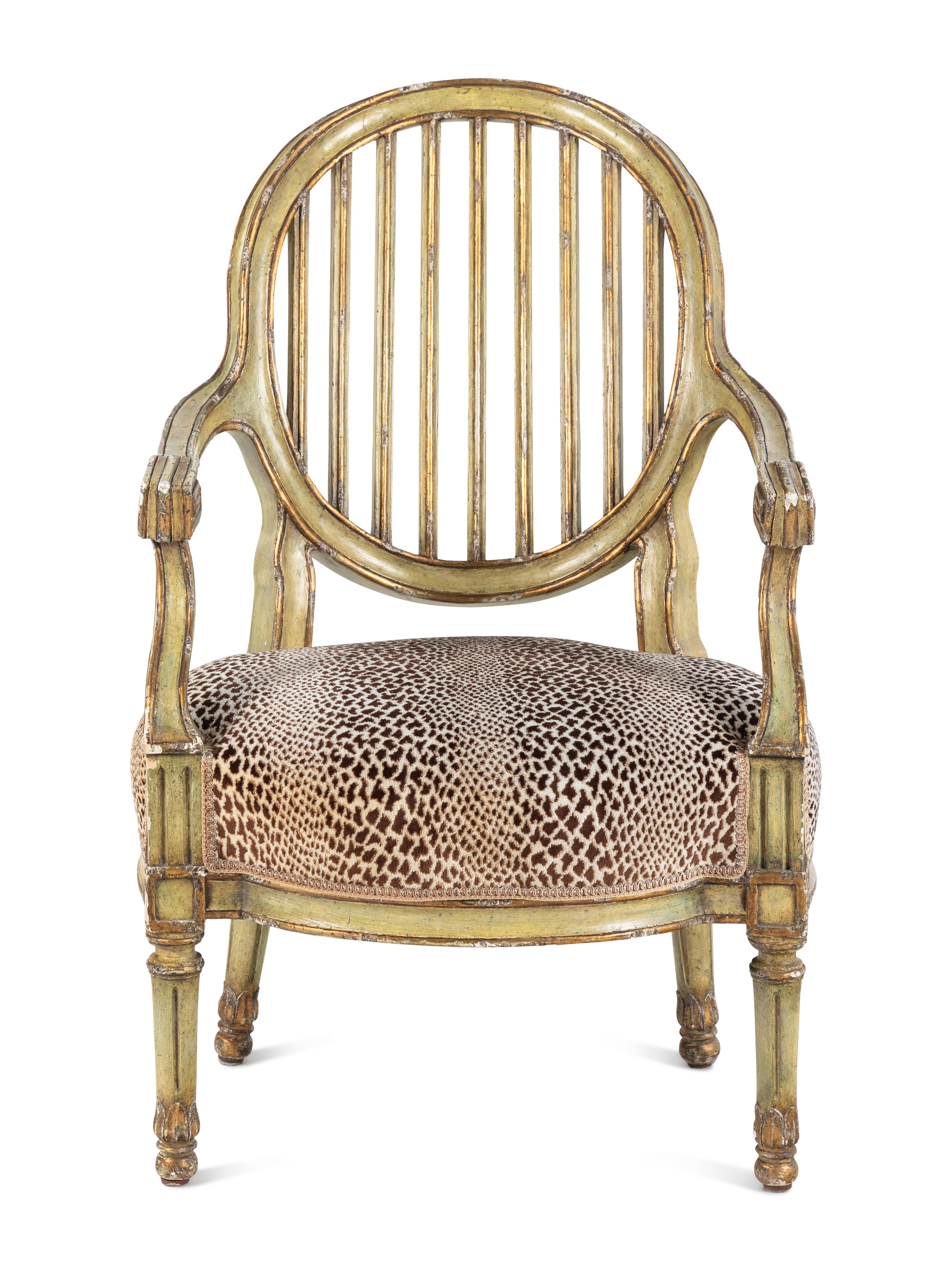 A Louis XVI Style Painted and Parcel-Gilt Fauteuil