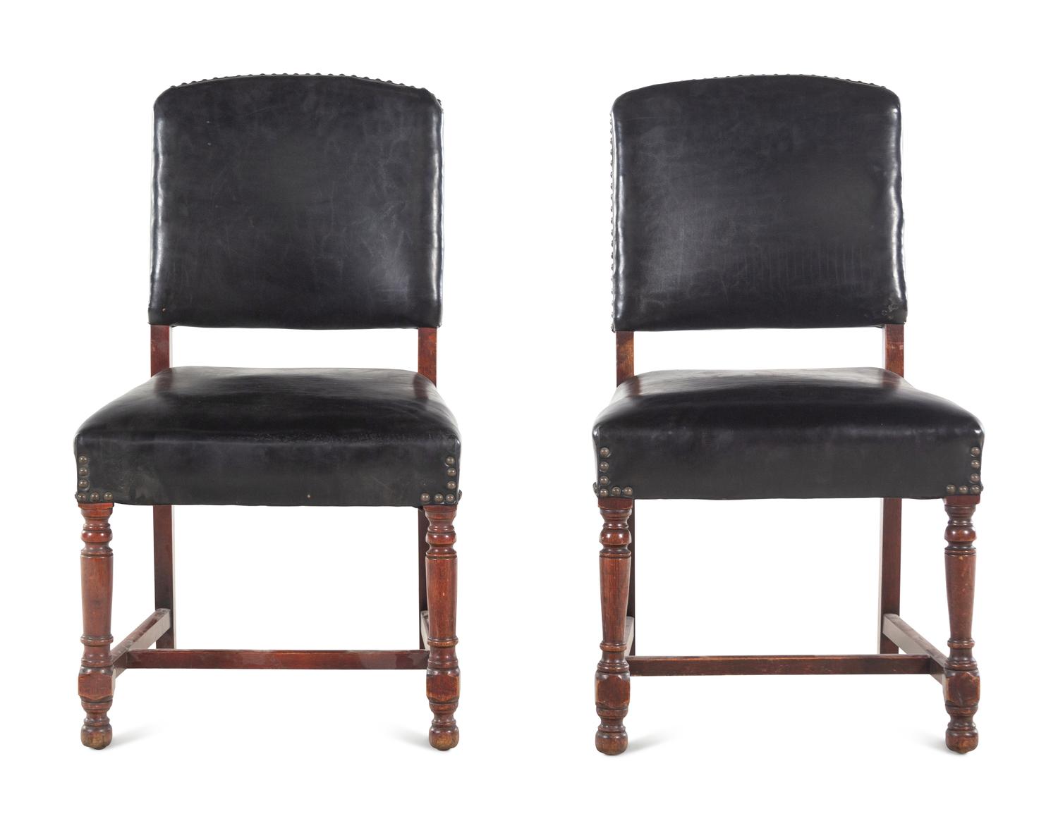 A Pair of Leather-Upholstered Side Chairs