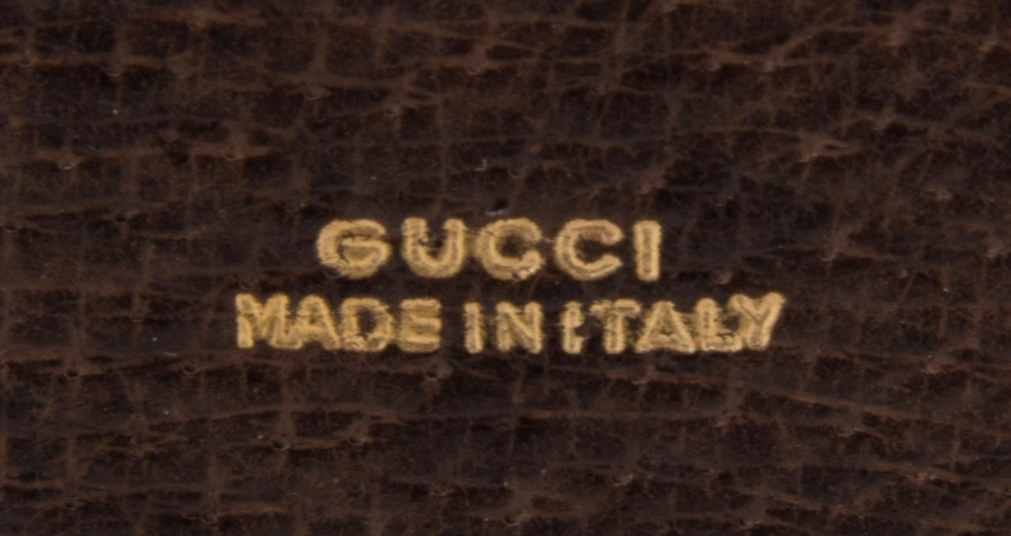 A Gucci Brown Leather Hardsided File Case, 13" x 12" x 5".
