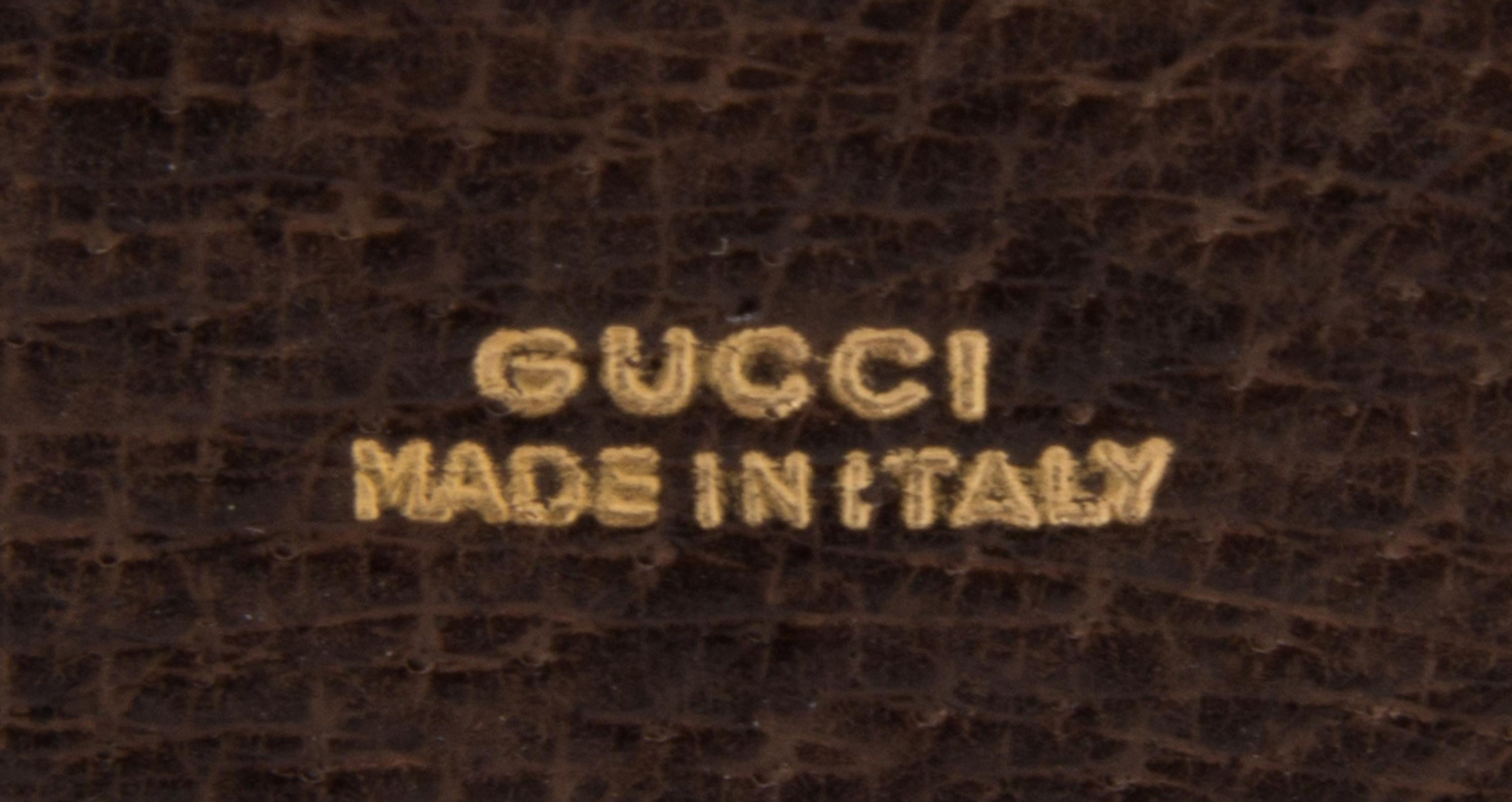 A Gucci Brown Leather Hardsided File Case, 13" x 12" x 5".
