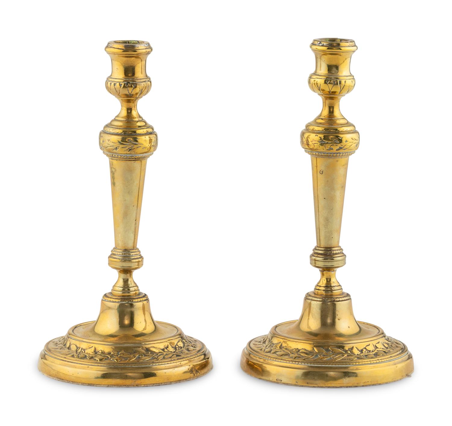 A Pair of Louis XV Brass Candlesticks