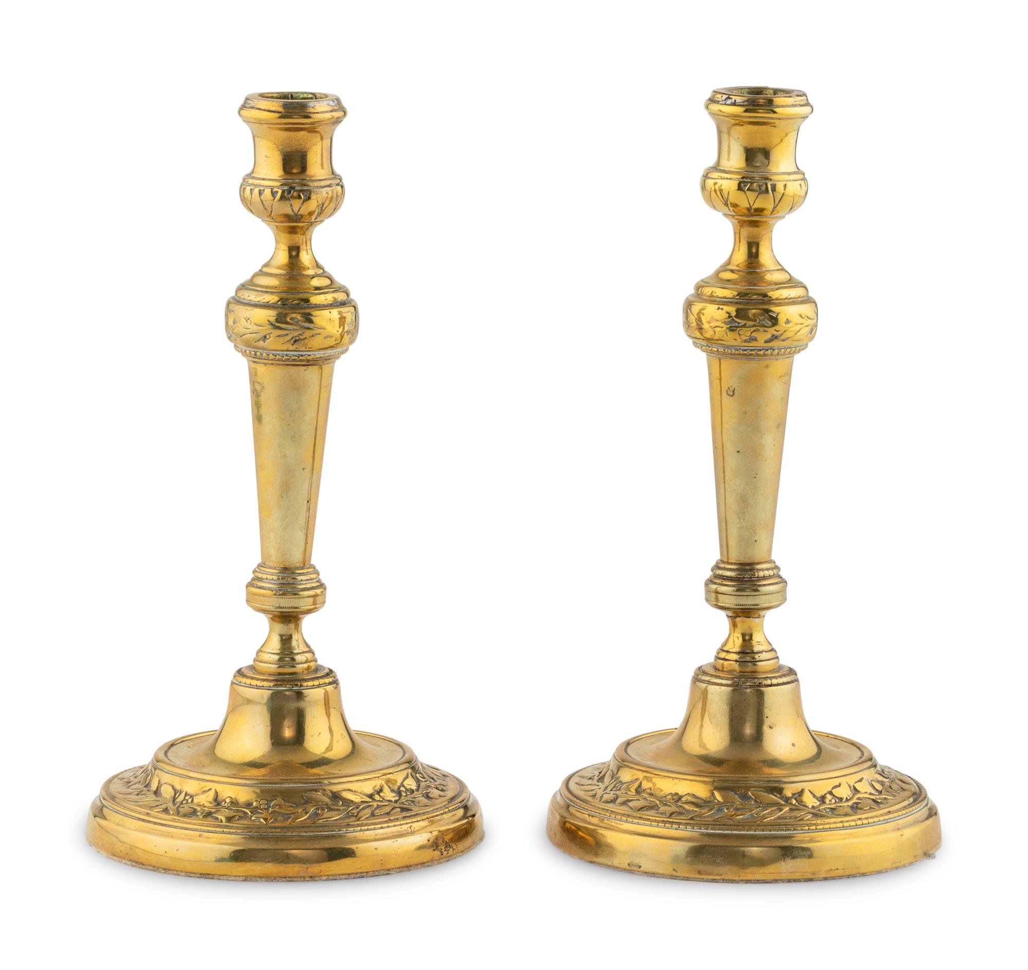A Pair of Louis XV Brass Candlesticks