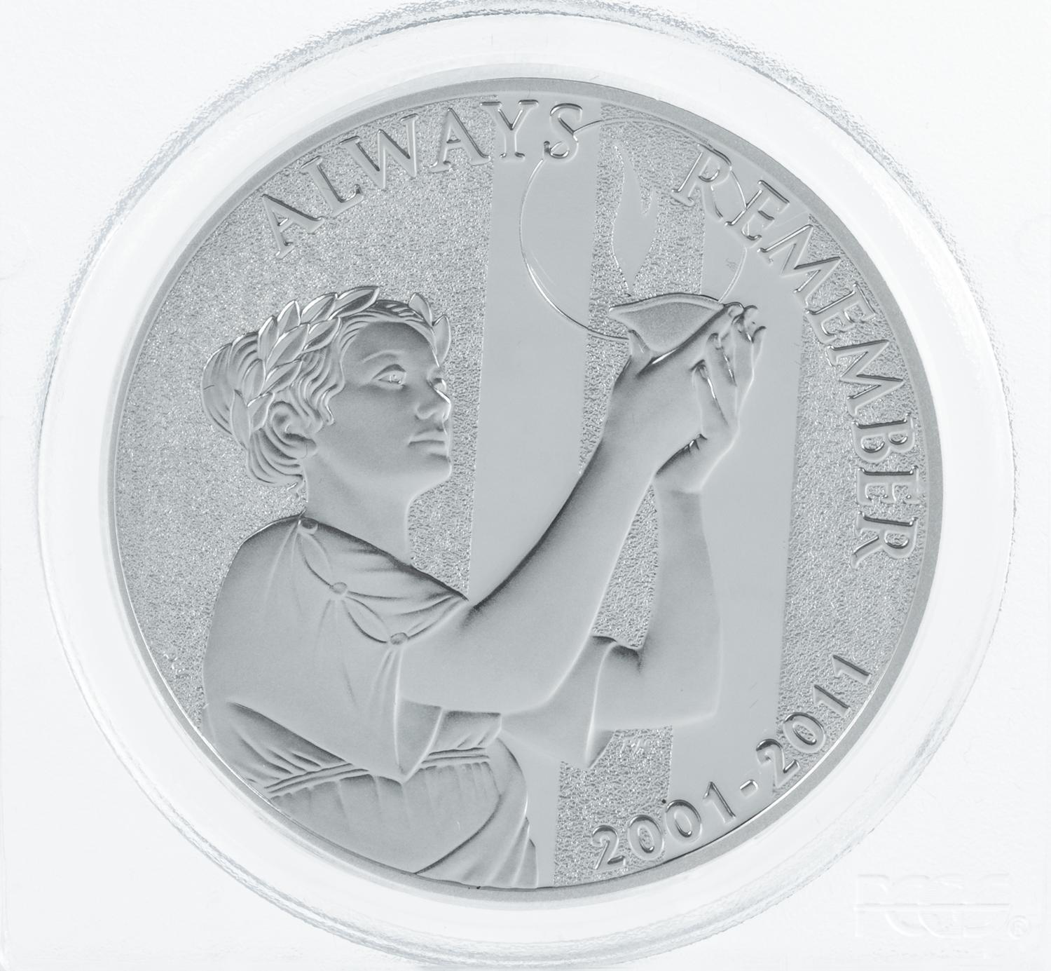 A Pair of United States 2011-W September 11, 2001 Memorial Limited Edition First Strike 1 Oz. Silver Medals