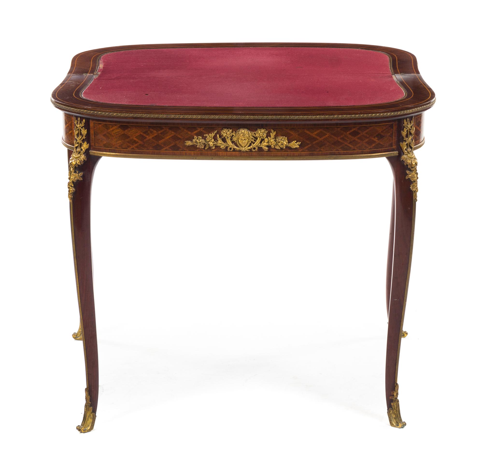 A French Gilt Bronze Mounted Kingwood and Parquetry Games Table Height 30 1/2 x width 33 1/8 x depth 16 1/4 inches. — LATE 19TH CENTURY