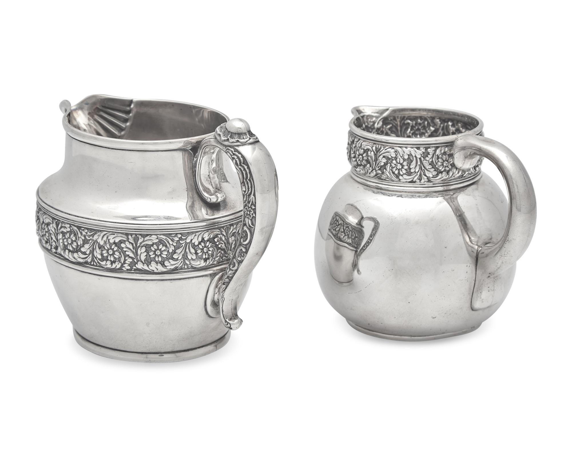 Two Sterling Silver Floral Repousse Pitchers, Tiffany & Co., New York, NY, Circa 1880-1890s