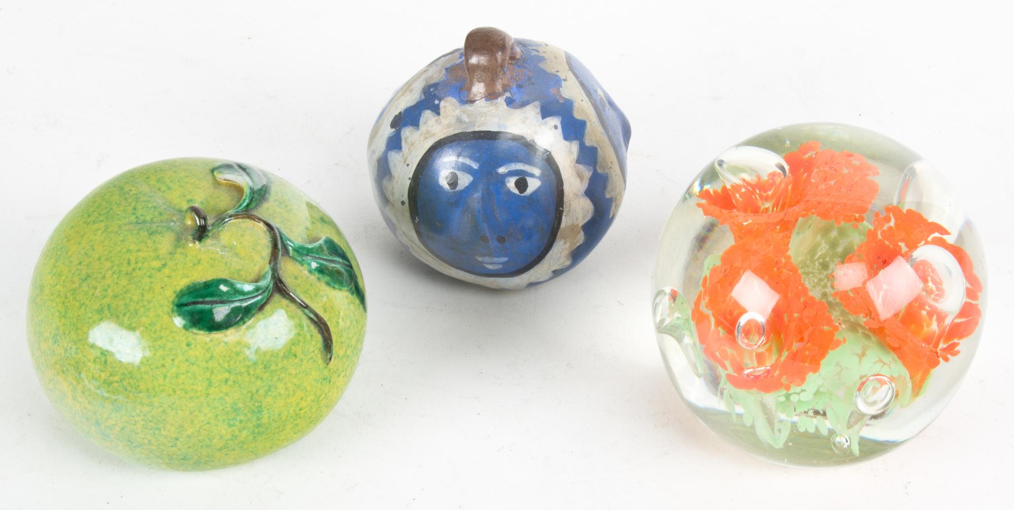 A Group of Paperweights Height of tallest 9 inches.