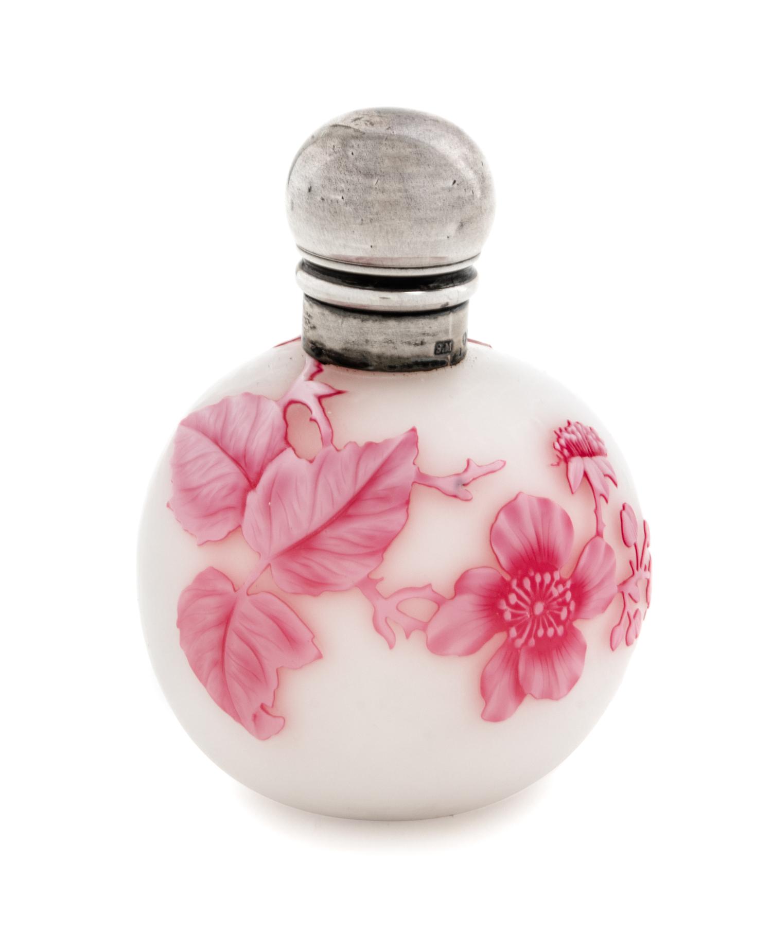 Attributed to Thomas Webb & Sons, 1887, a silver mounted cameo glass vase, of spherical form with flower and leaf decoration