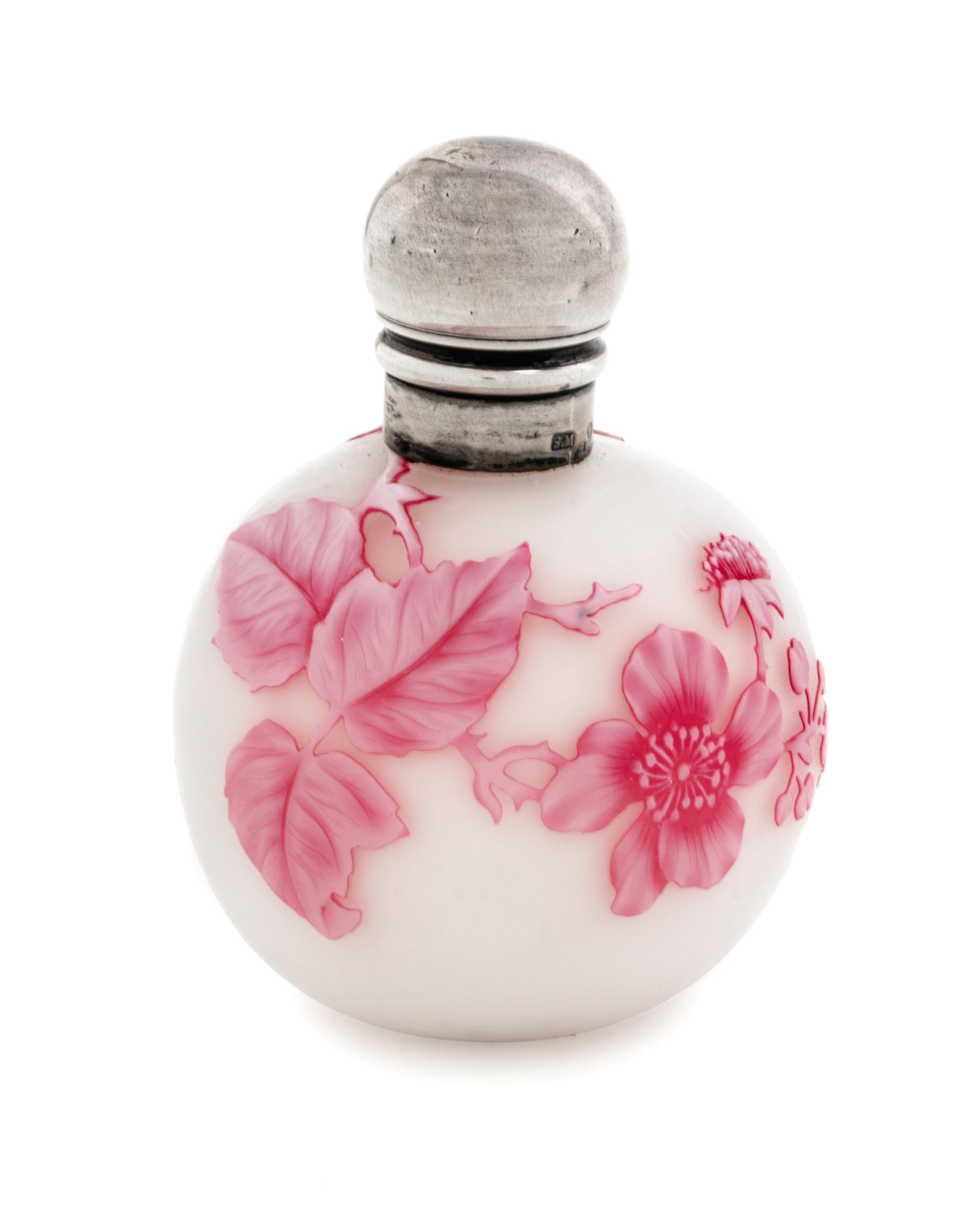 Attributed to Thomas Webb & Sons, 1887, a silver mounted cameo glass vase, of spherical form with flower and leaf decoration
