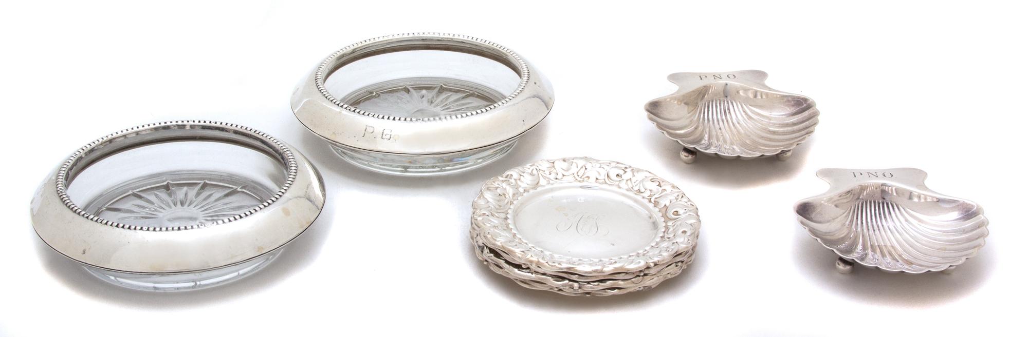A Group of American Silver Monogrammed Ashtrays, , comprising a pair of Tiffany shell form, 6 Whiting with repousse borders, and a pair