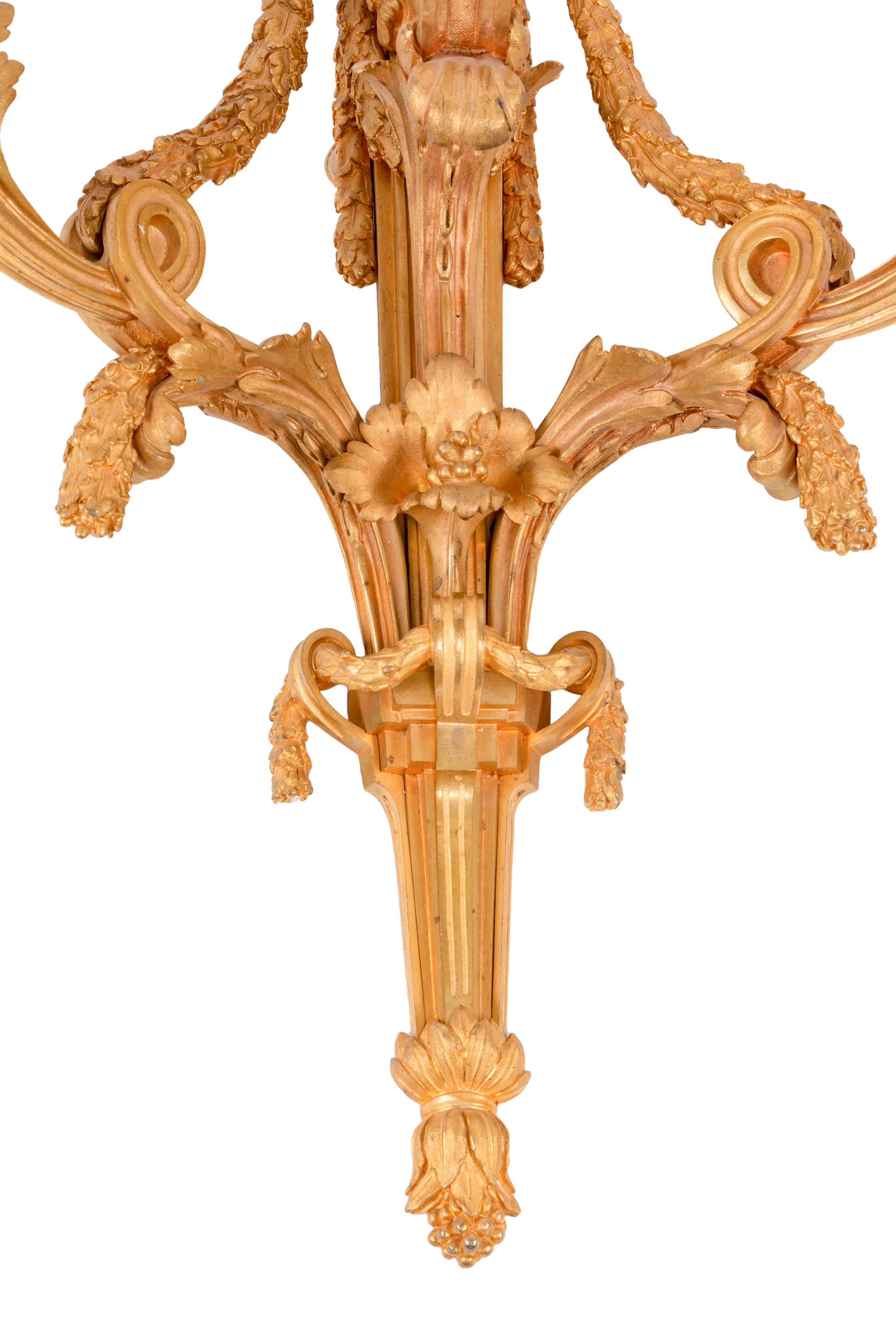 A Pair of Louis XV Style Gilt Bronze Three-Light Sconces