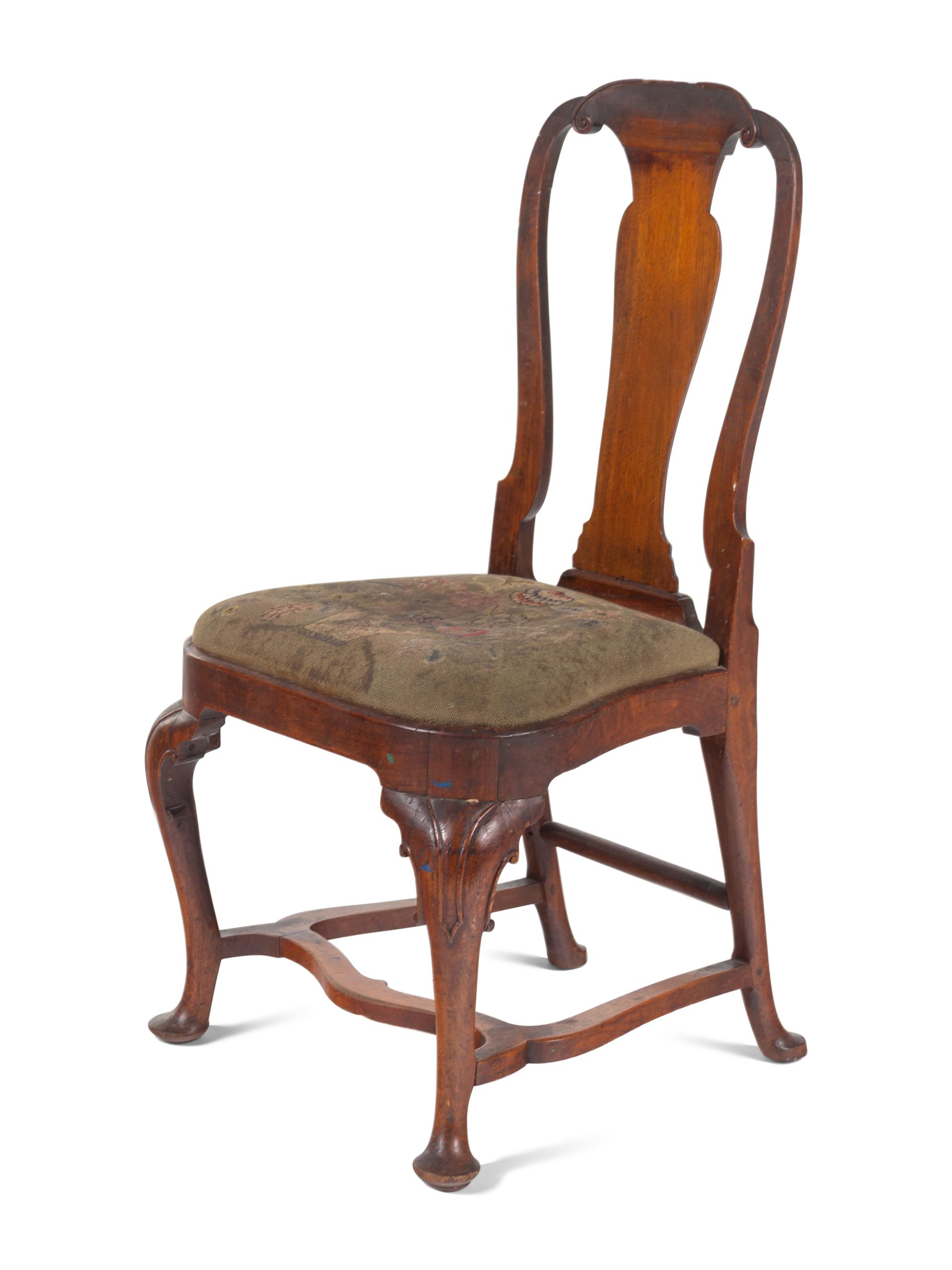 A Queen Anne Volute Carved Walnut Flat-Stretcher Pad-Foot Side Chair