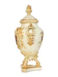 A Rudolstadt Painted and Parcel Gilt Porcelain Lidded Urn