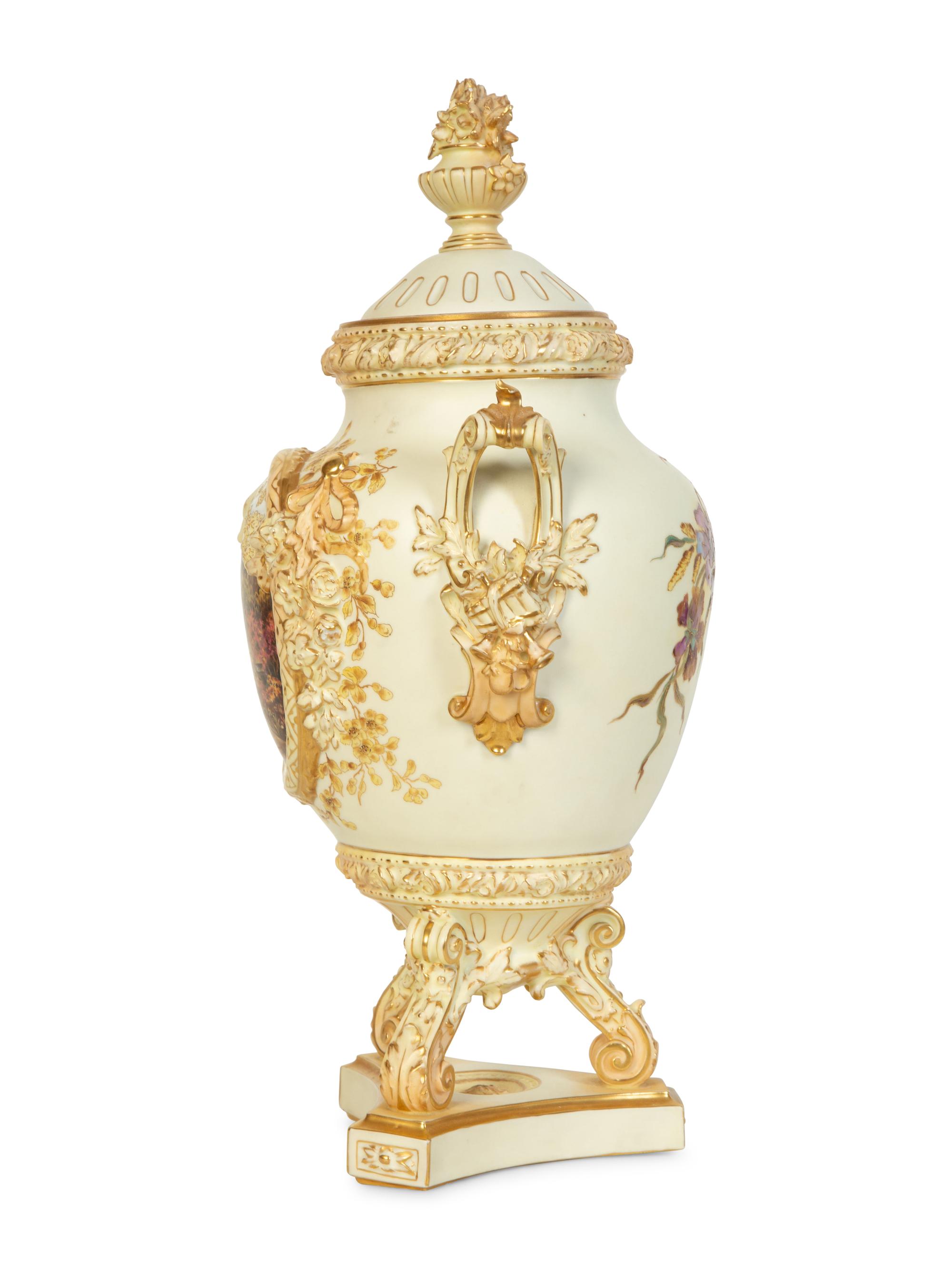 A Rudolstadt Painted and Parcel Gilt Porcelain Lidded Urn