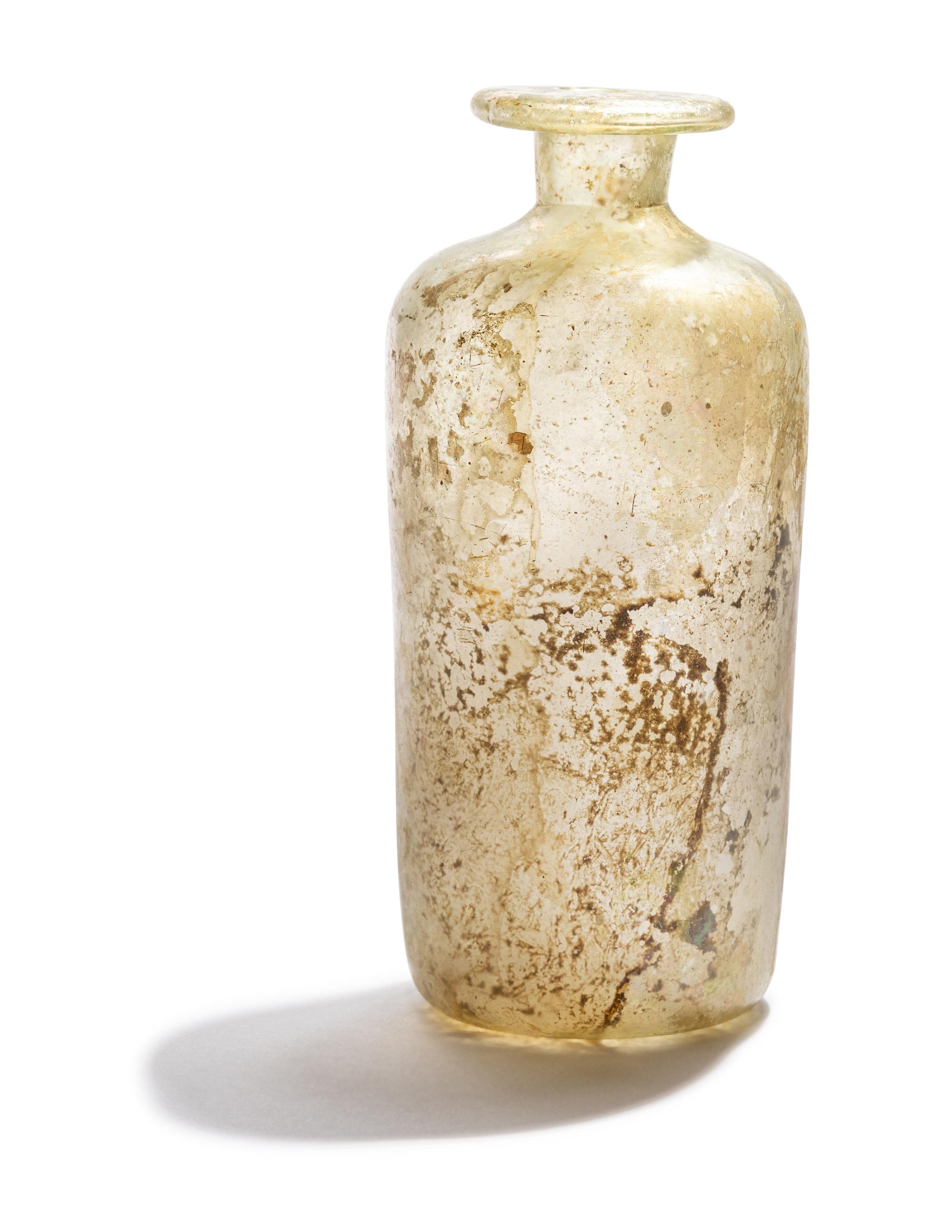 A Roman Pale Blue Glass Bottle