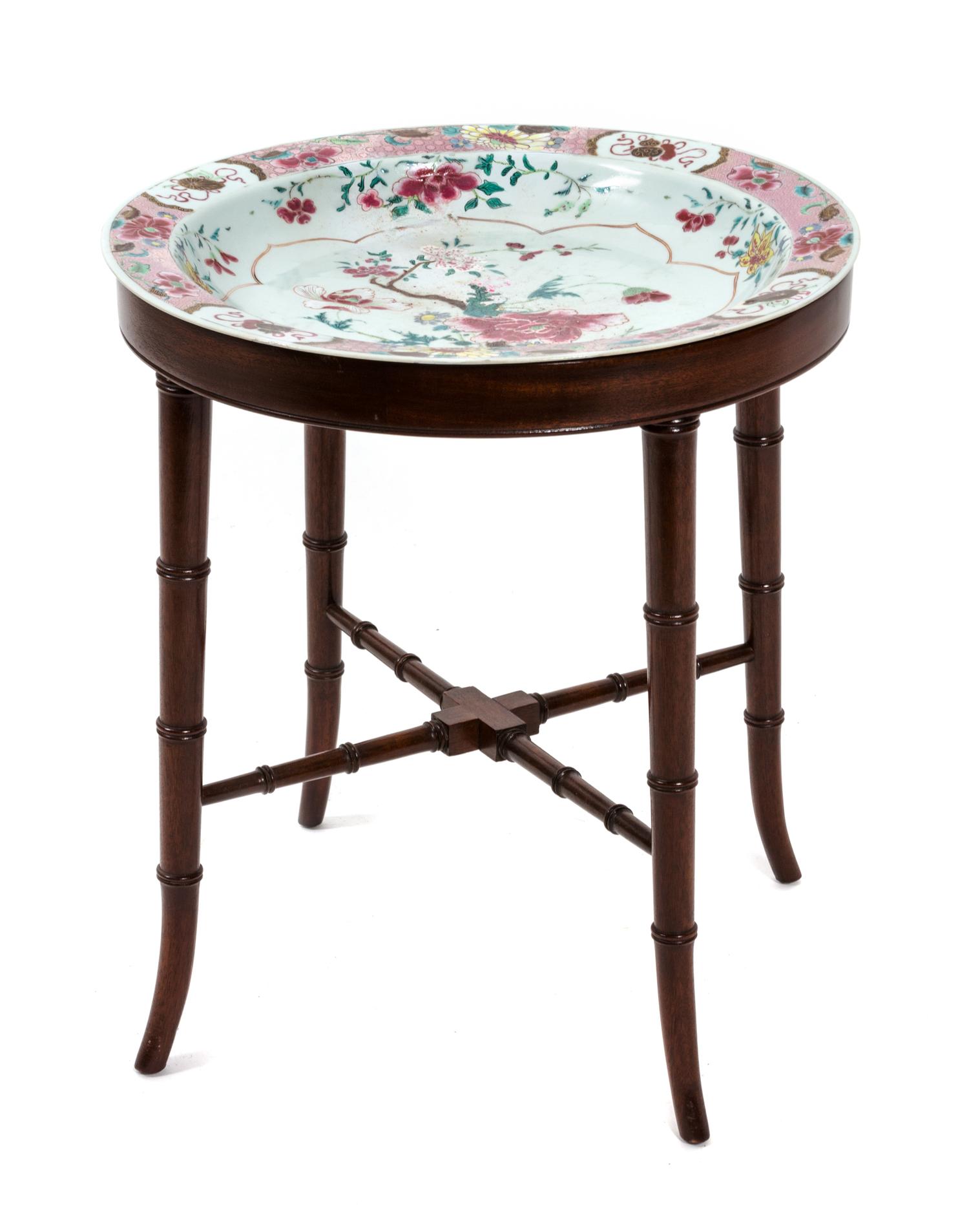 A Regency Style Mahogany Side Table Height of table 18 inches, diameter of charger 16 3/4 inches. — 19TH CENTURY