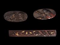 Eight Japanese Mixed-Metal Sword Fittings and Netsuke