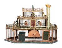 A Folk Art Cut and Painted Metal Paddleboat Form Birdcage
