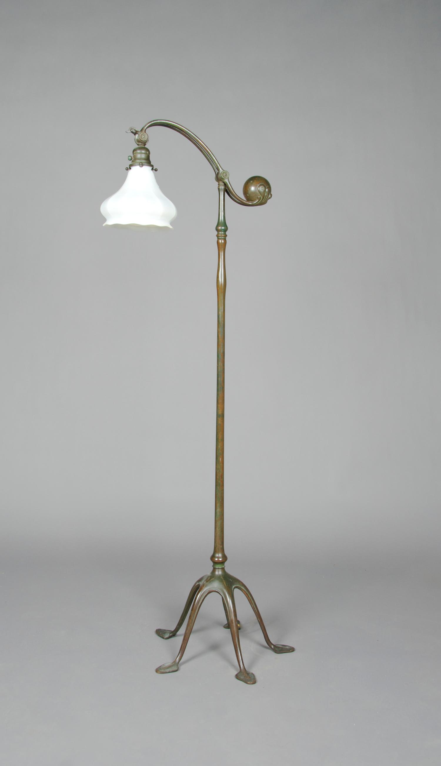 A Tiffany Studios Bronze Counter Balance Floor Lamp, Height 54 inches.