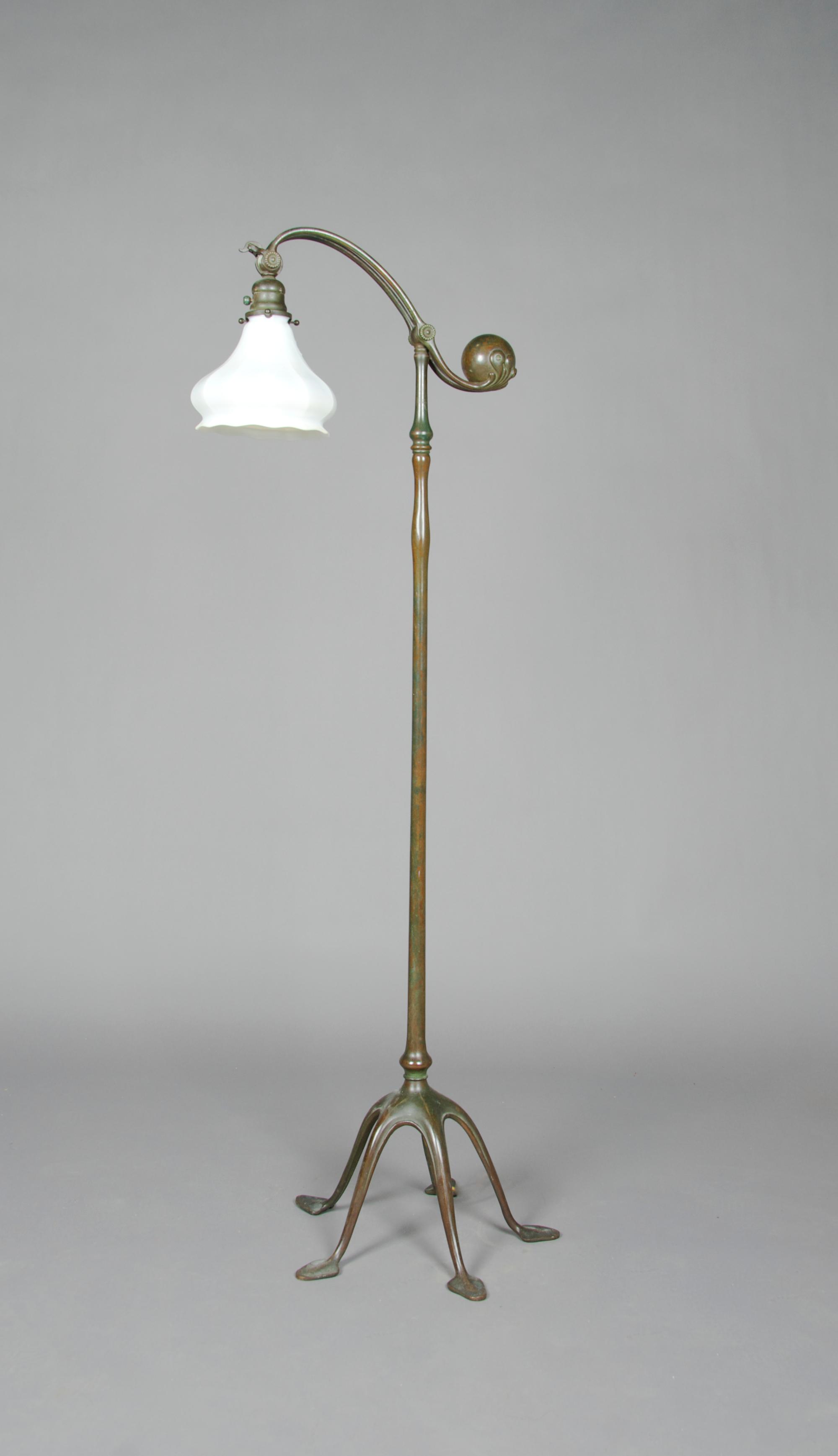 A Tiffany Studios Bronze Counter Balance Floor Lamp, Height 54 inches.