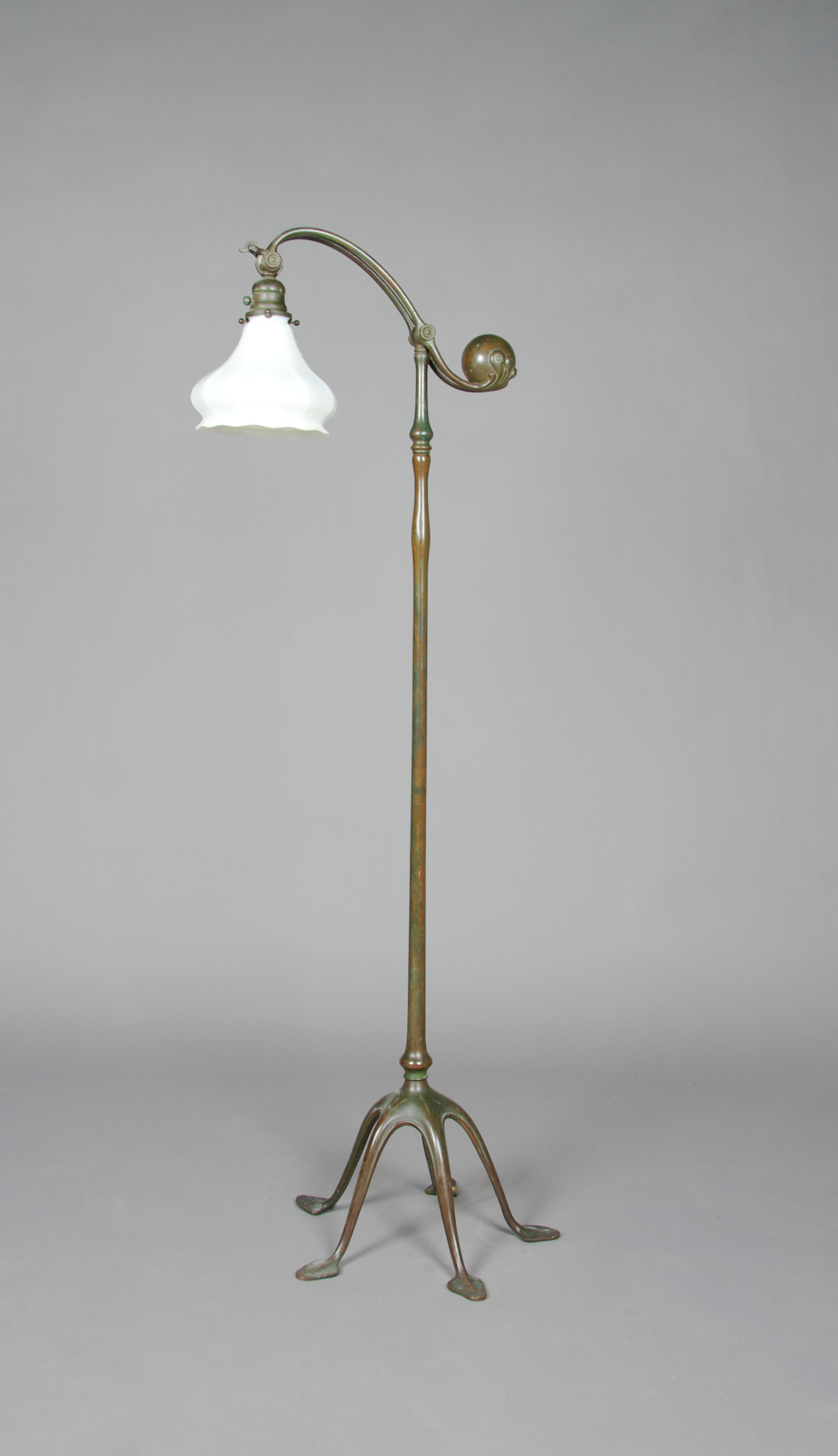 A Tiffany Studios Bronze Counter Balance Floor Lamp, Height 54 inches.