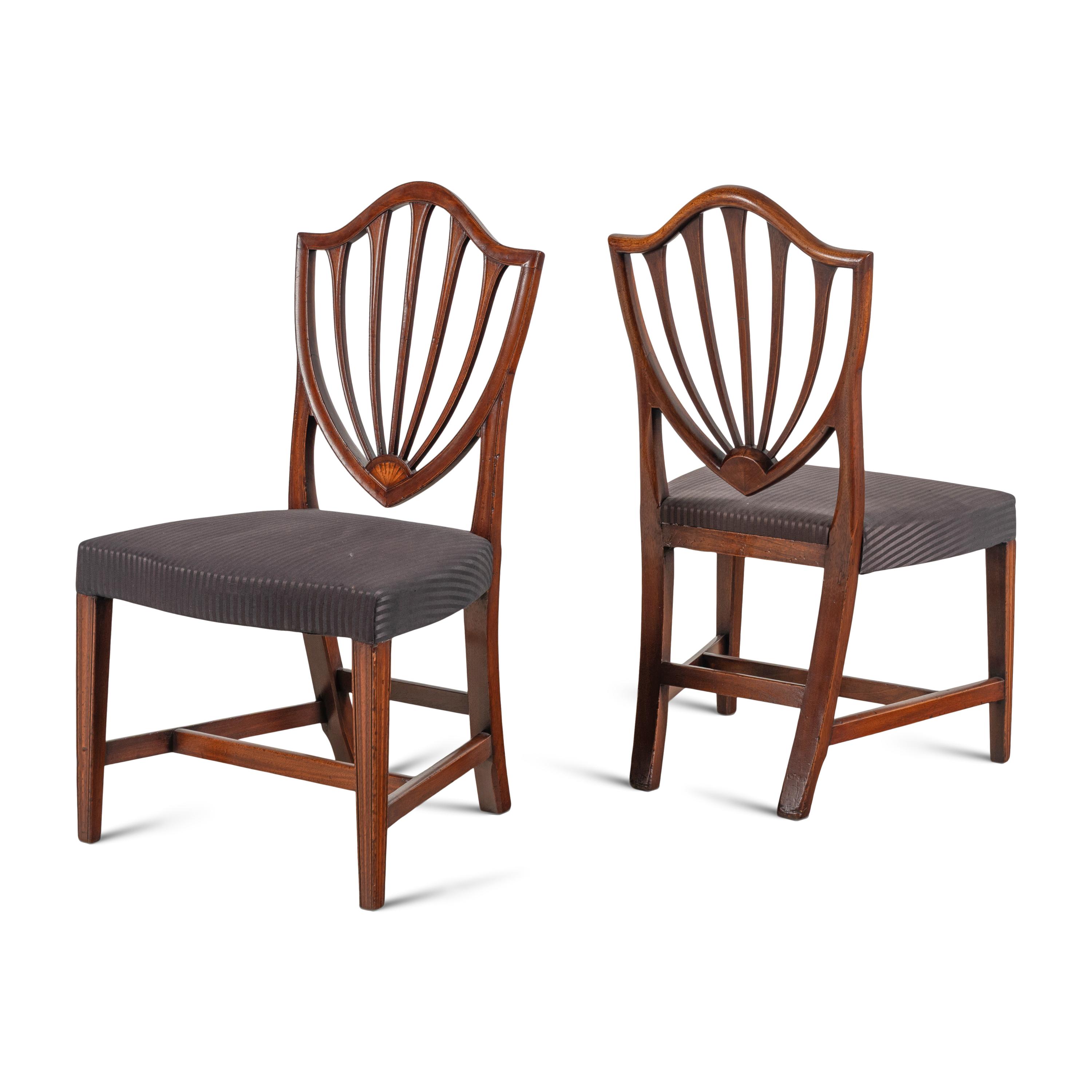 An Assembled Set of Five Mahogany Dining Chairs