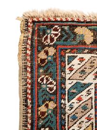 A Yellow-Ground Shirvan Wool Rug