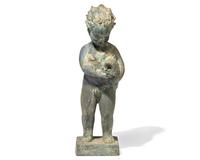 A cast zinc fountain head of a boy holding fish, 20th century