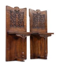 A Pair of Renaissance Revival Carved Oak Wall Shelves