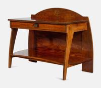 An Austrian Secessionist Inlaid Dining Suite, comprising a sideboard, a server, an extension dining table with five leaves, six side chairs and four armchairs