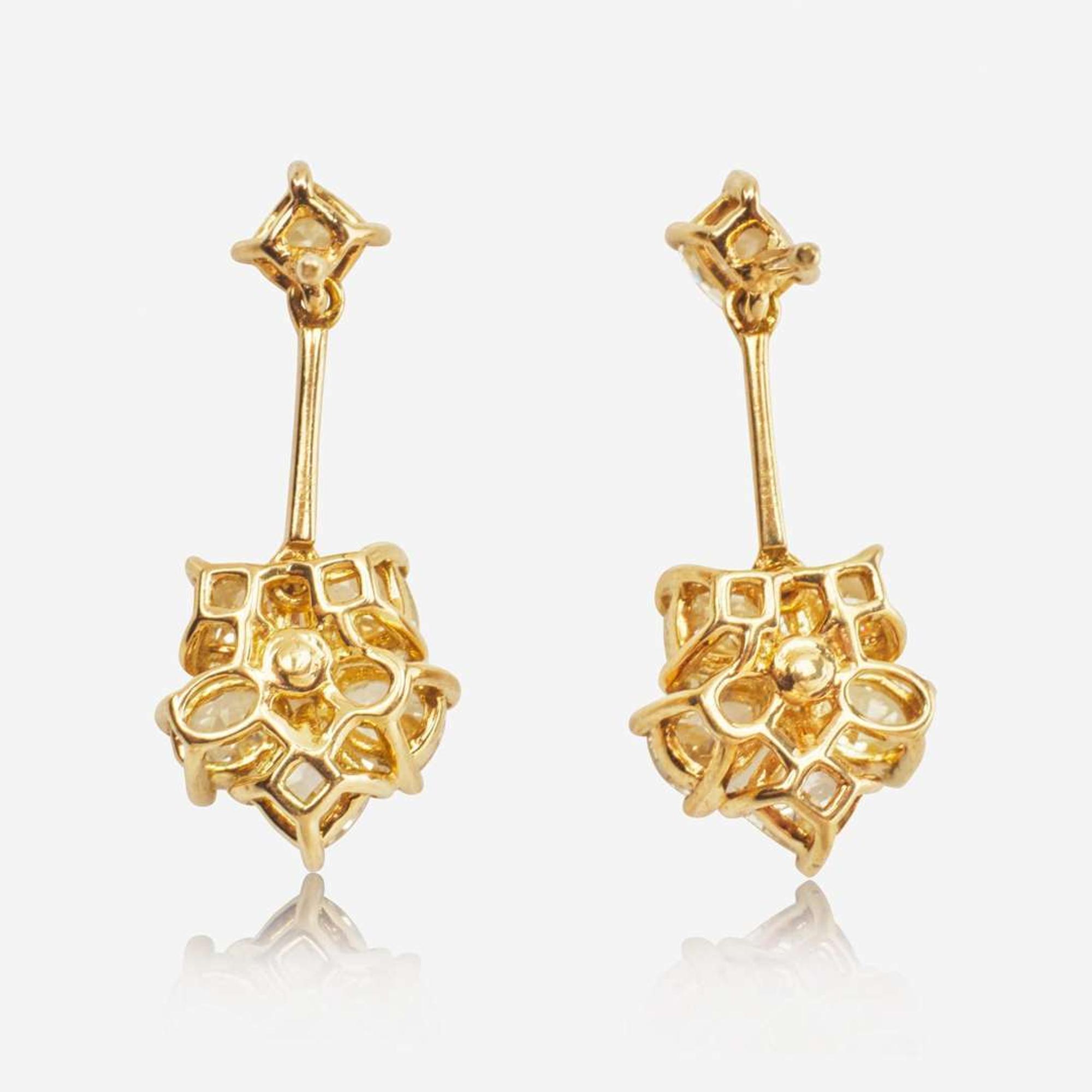 A Pair of 18K Yellow Gold and Diamond Earrings