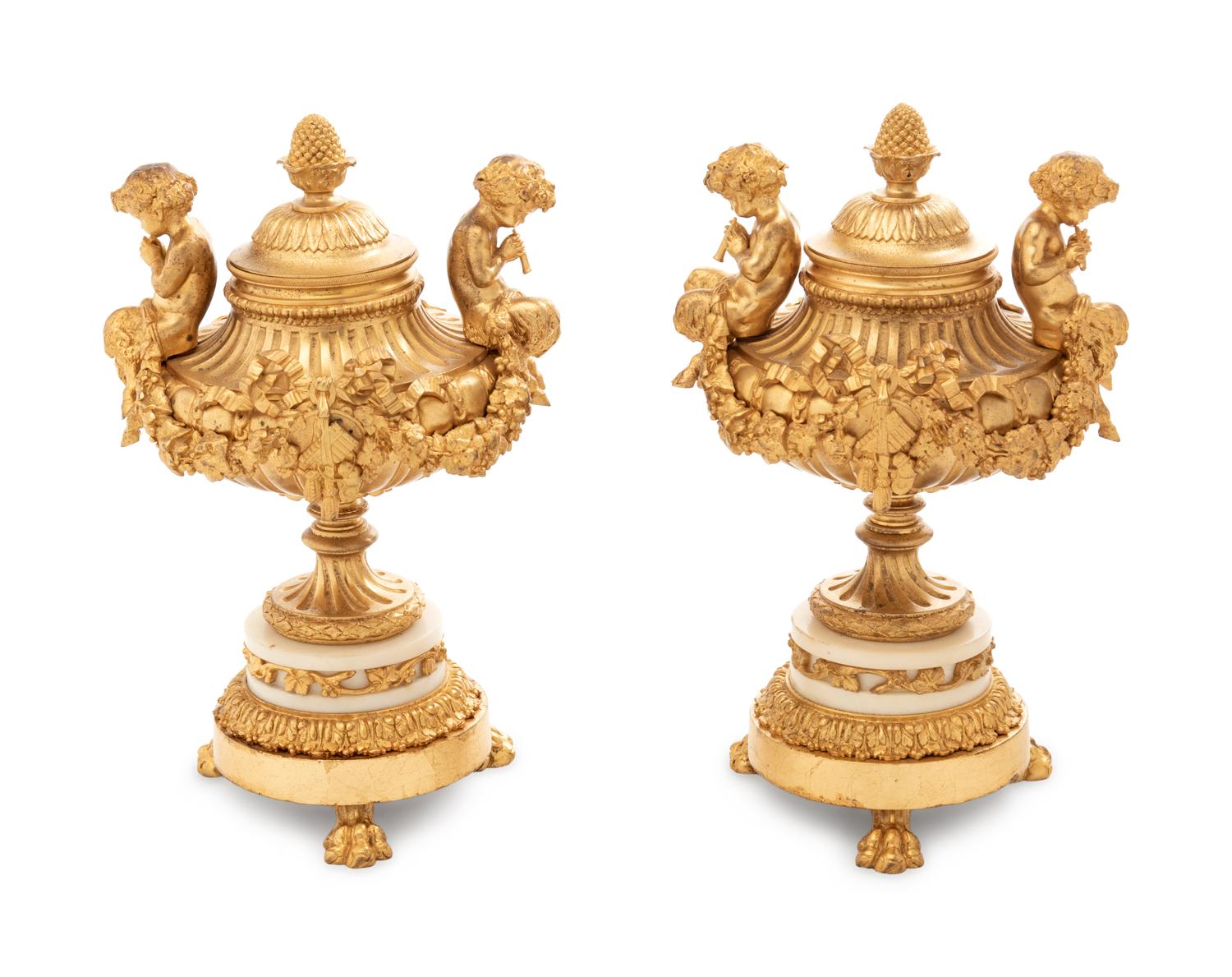 A Pair of Louis XV Style Gilt Bronze and White Marble Covered Urns