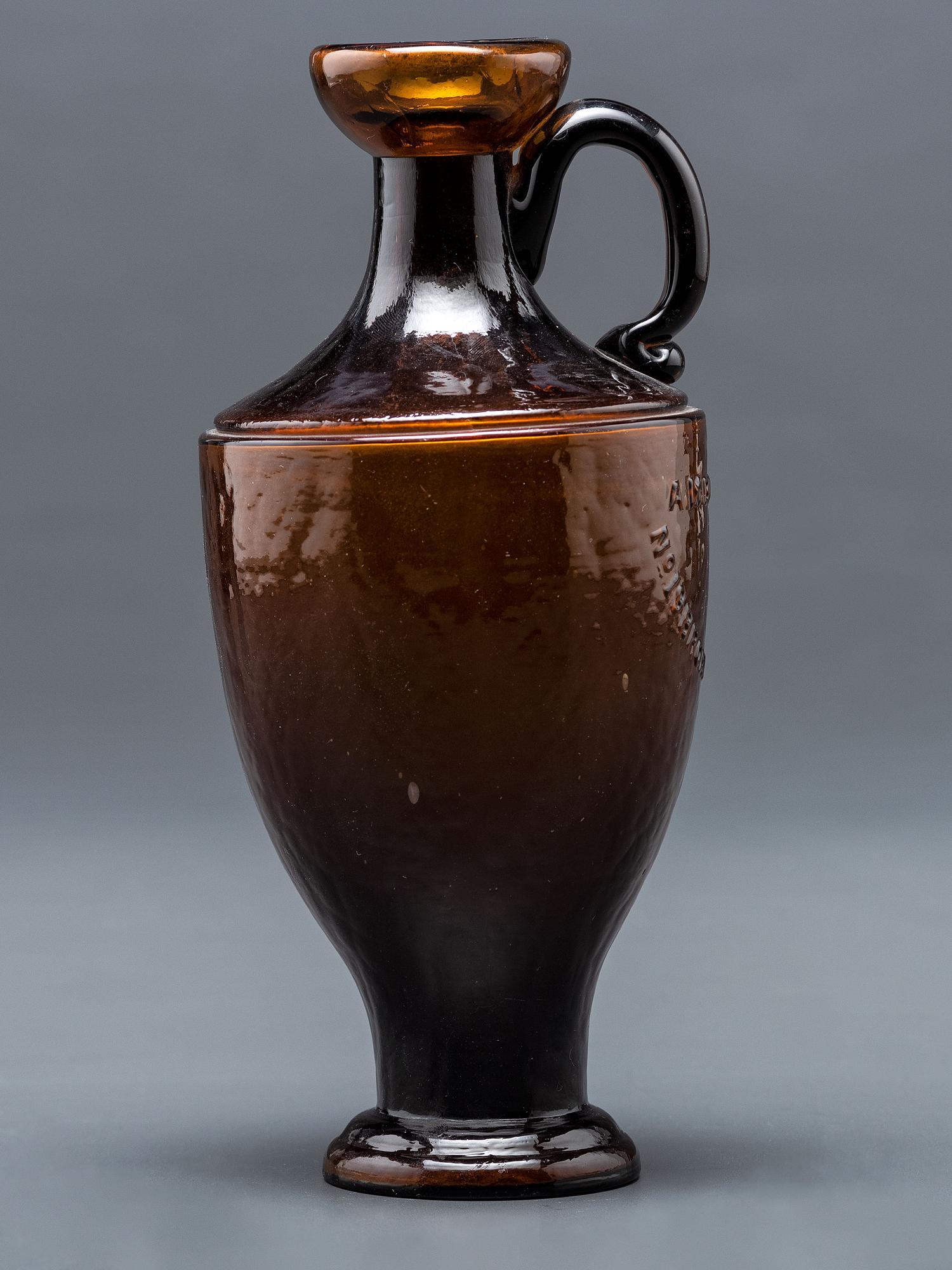A New York Mold-Blown Amber Bottle